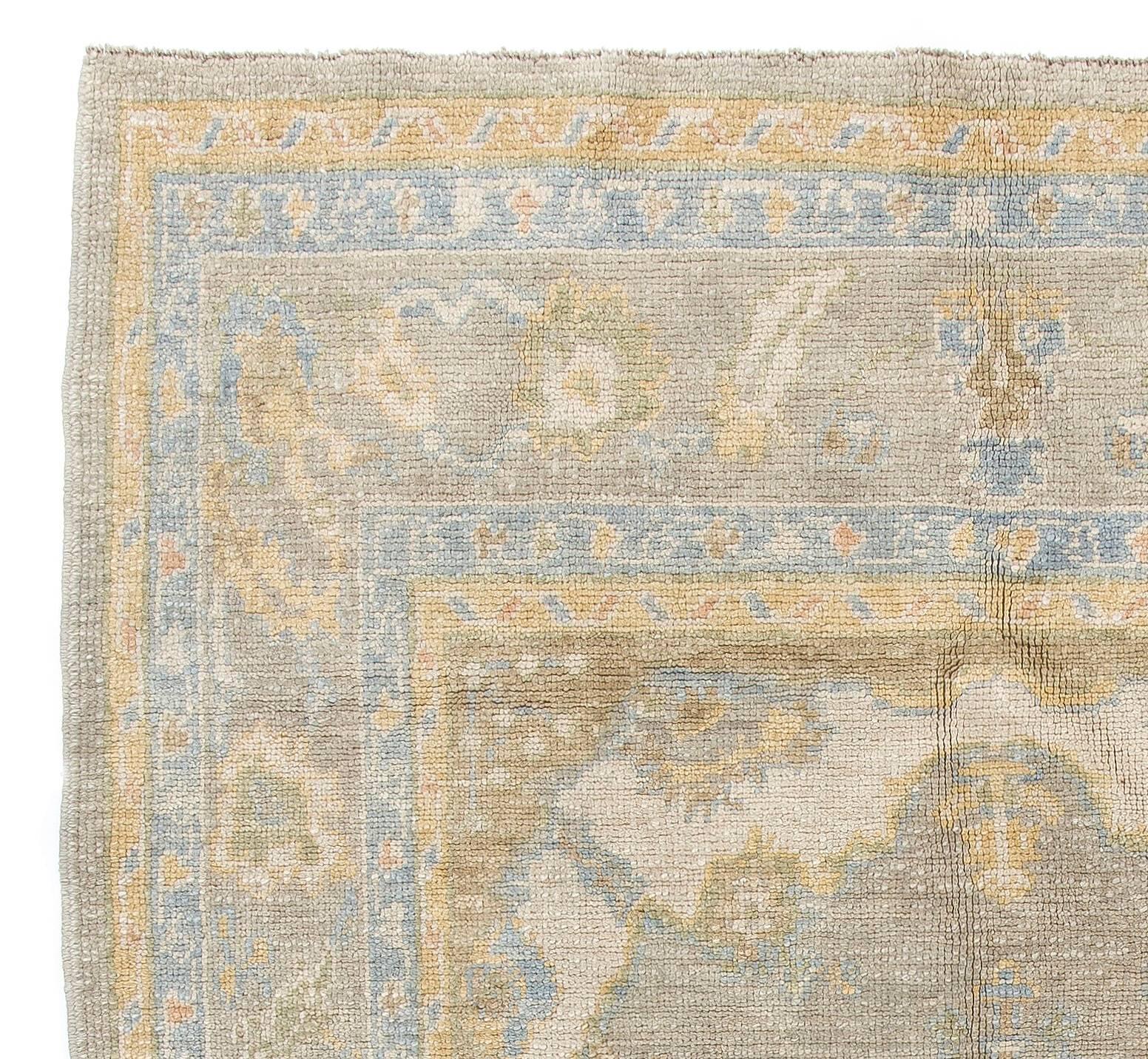 An antique inspired and look hand-knotted Oushak carpet made with finest
 hand-spun sheep wool.

Size: 5'4