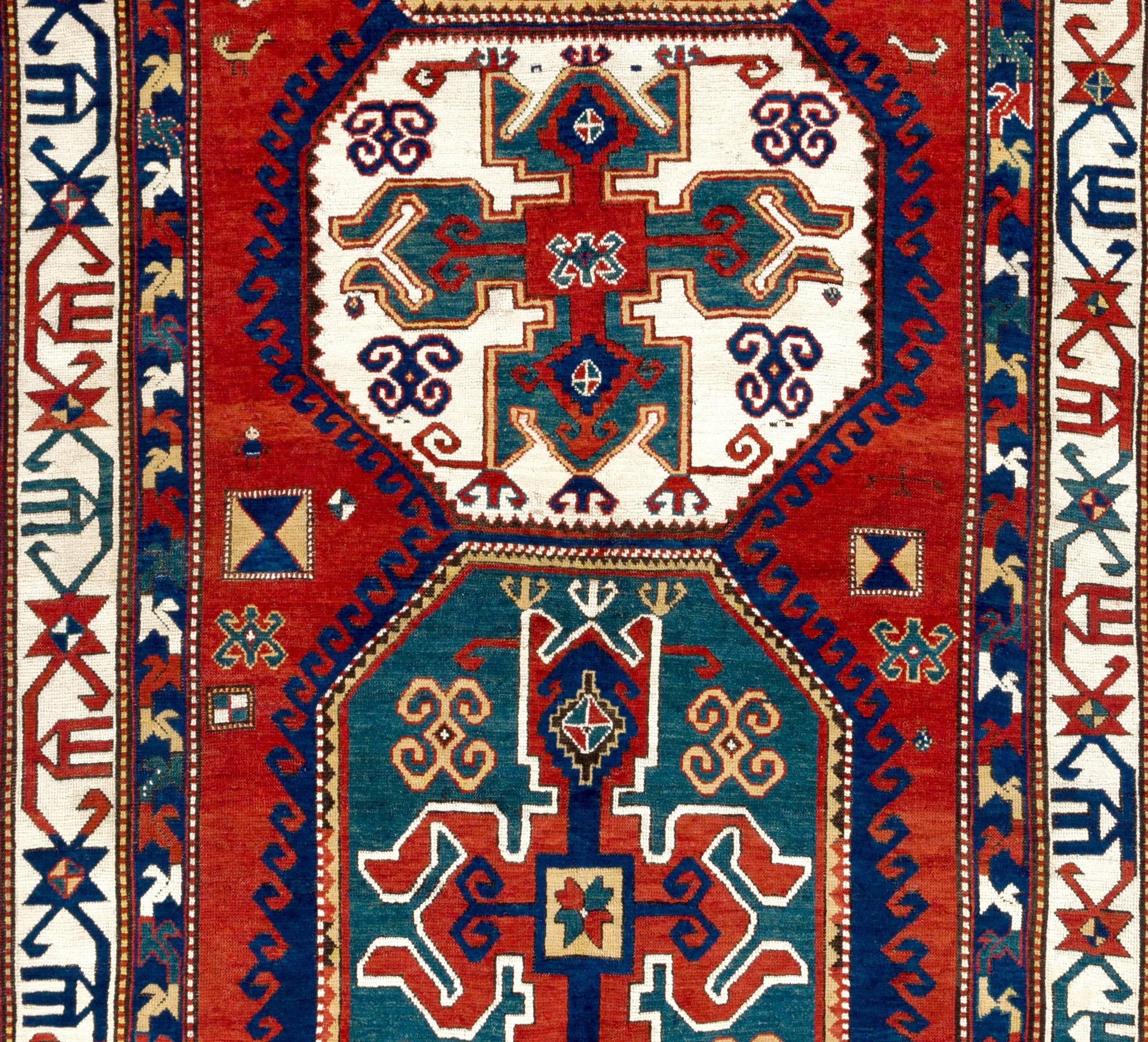 A large and early antique Kazak rug from South Caucasus with a bold and powerful design and natural dyes. Soft lustrous wool pile on wool foundation, well preserved condition. Measures: 6 x 9 ft.