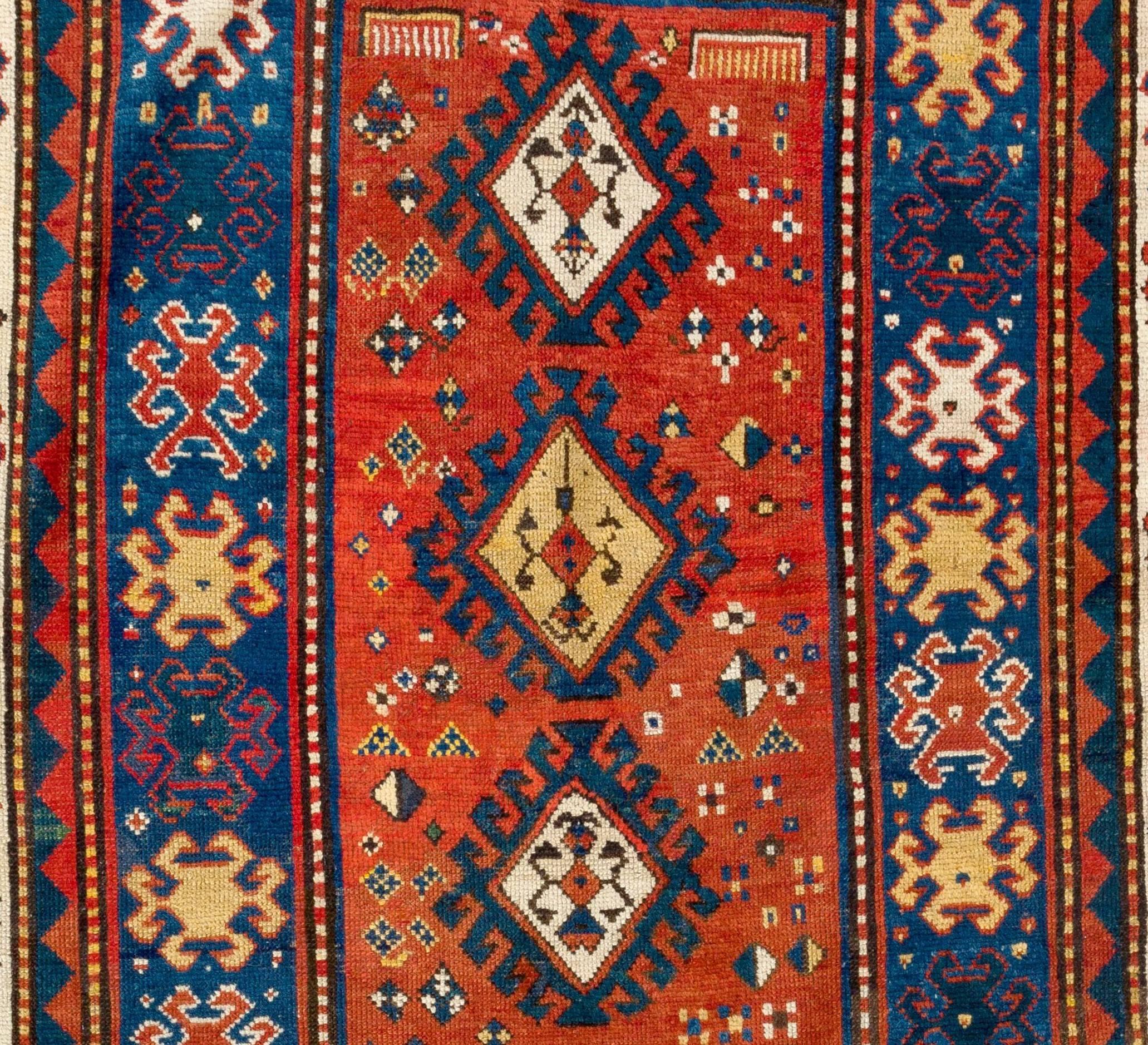 Antique Caucasian Kazak rug. Red, blue, green, yellow colors, circa 1850
100% wool. Natural dyes. Good condition.