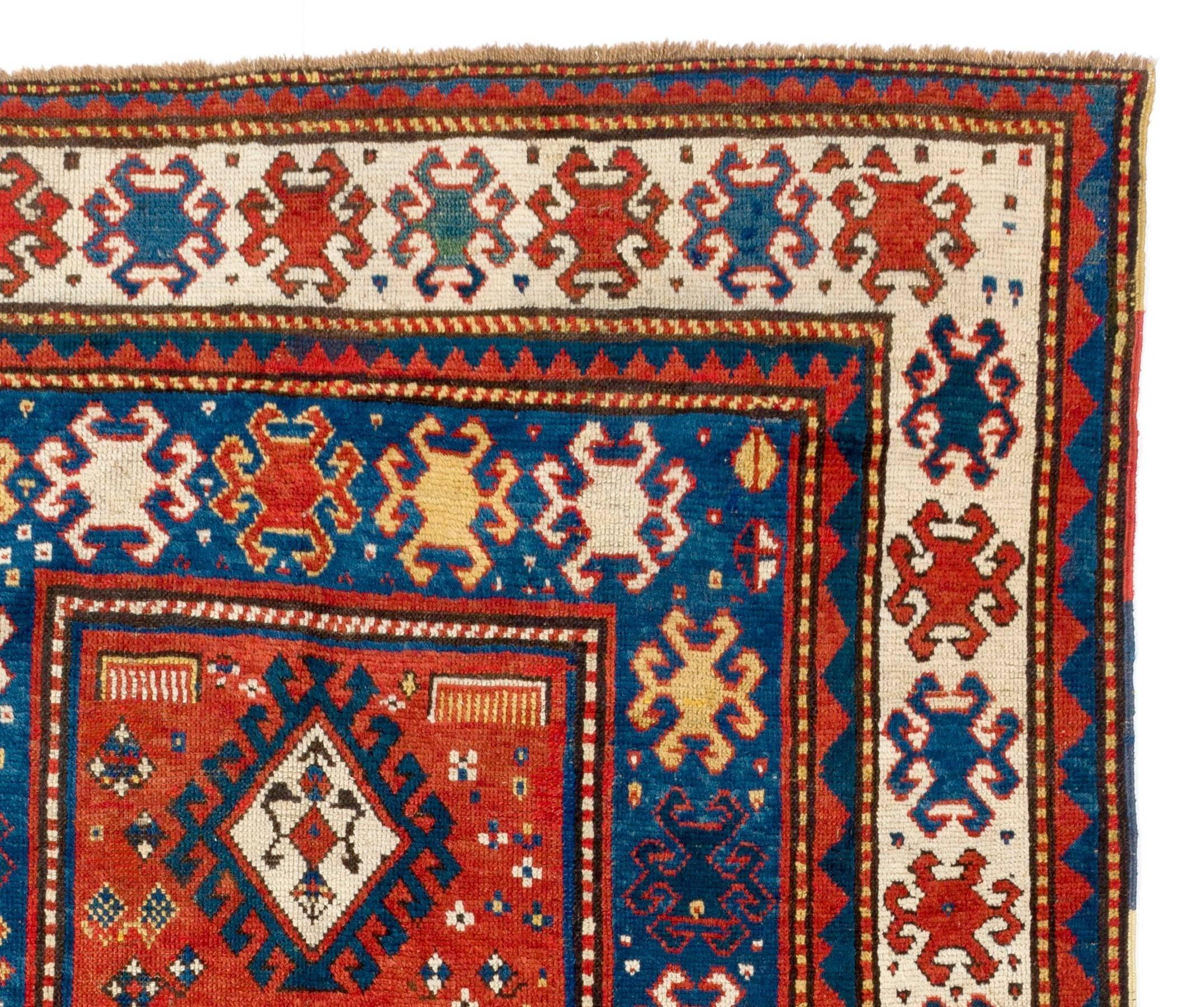 Hand-Knotted Antique Caucasian Kazak Rug, Red, Blue, Green, Yellow Colors, circa 1850 For Sale