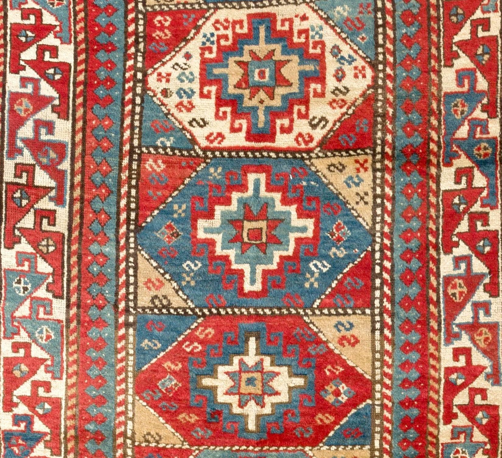 A colorful Caucasian Kazak rug made of natural dyed lambs wool pile on wool foundation, circa 1870.
Good condition and even medium pile.
