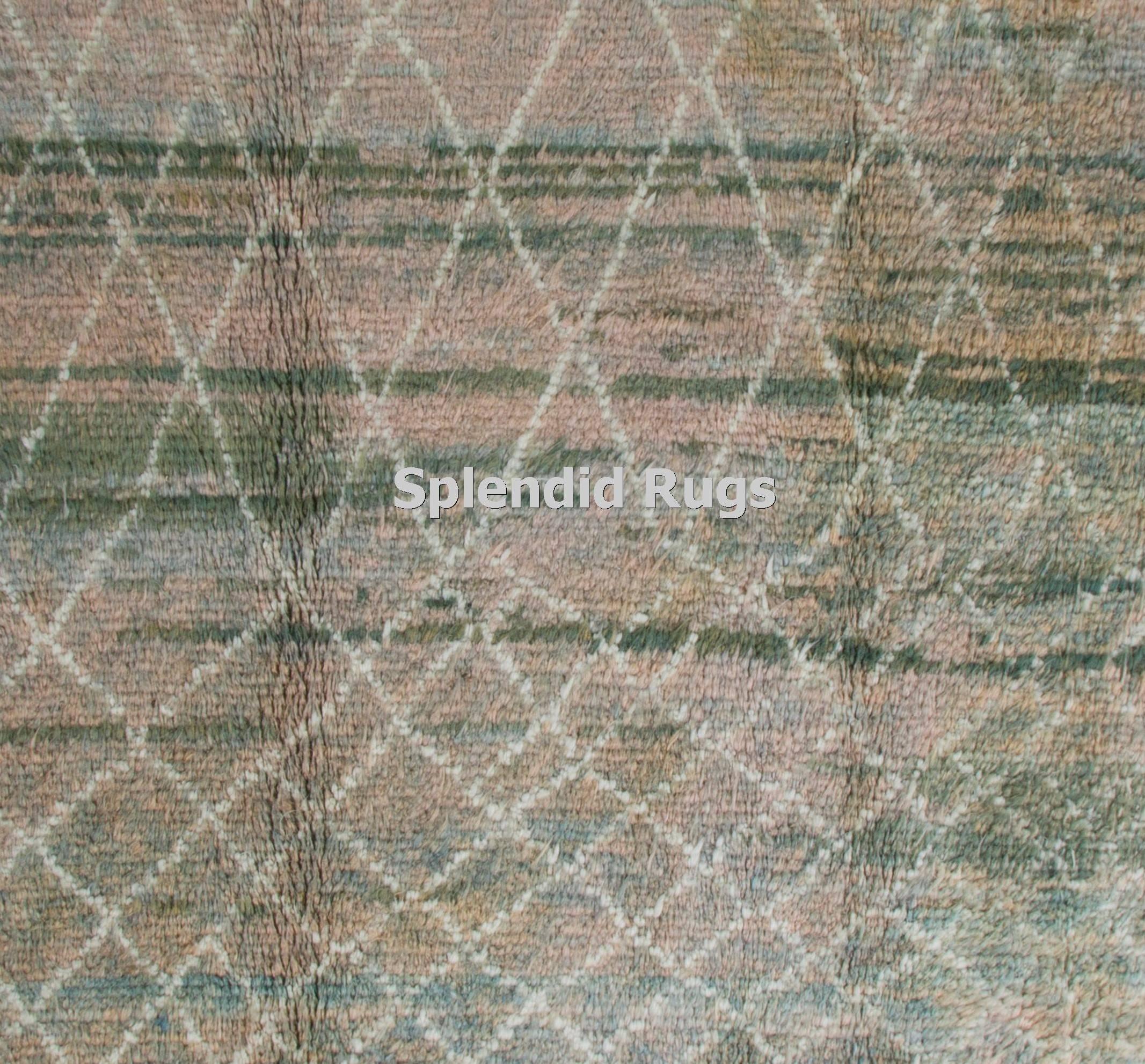 A contemporary hand-knotted Moroccan rug made of lamb’s wool. Thick and soft pile and beautiful aqua blue, turquoise, green and beige colors. Available as it is or made to measure in any size, design and color combination requested.