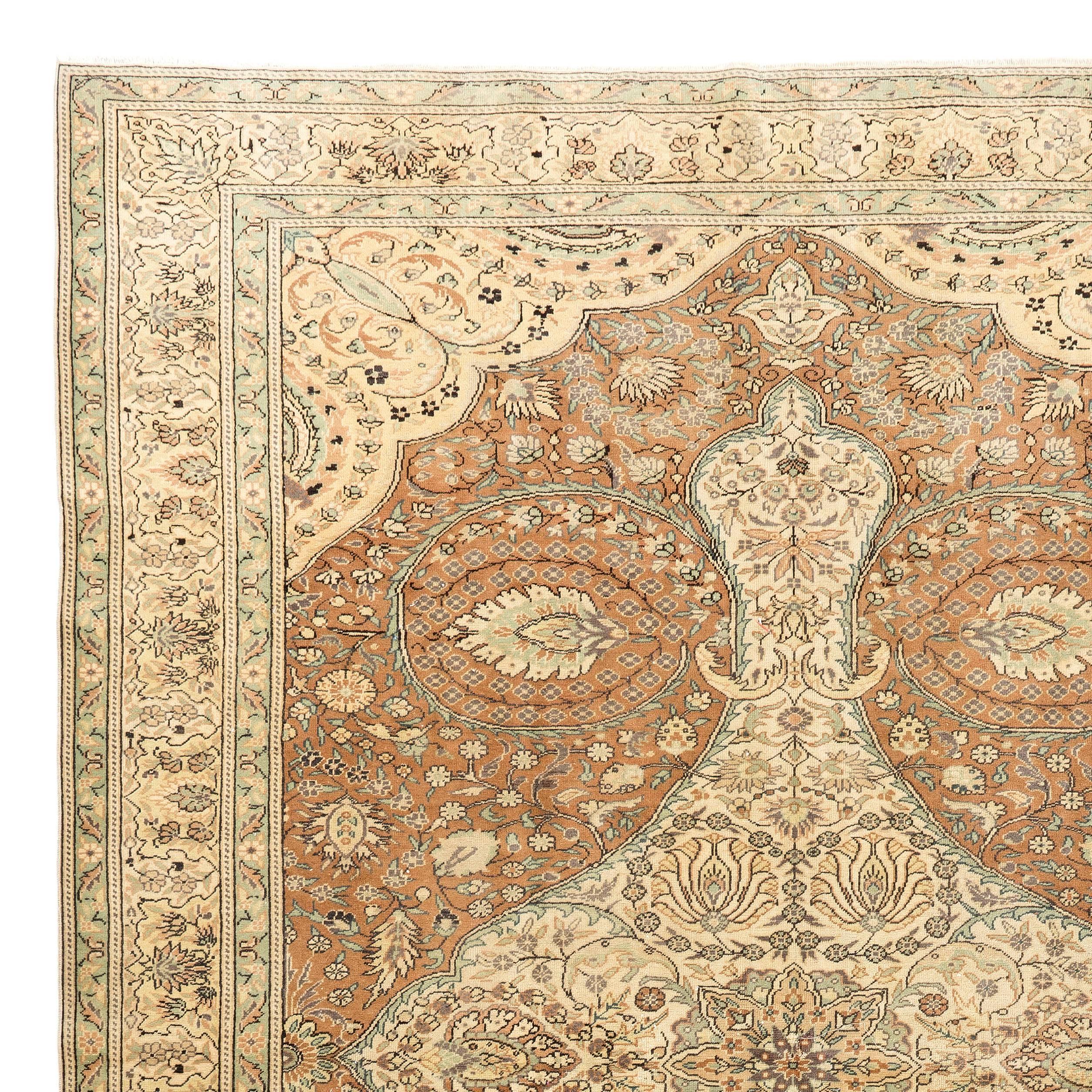 A finely hand-knotted rug from Kayseri region in Central Anatolia that has been a famous rug making centre, until late 1970s. This beautiful example is well drawn and in very good condition. Unusual earthy color palette with soft terra-cotta, brown,