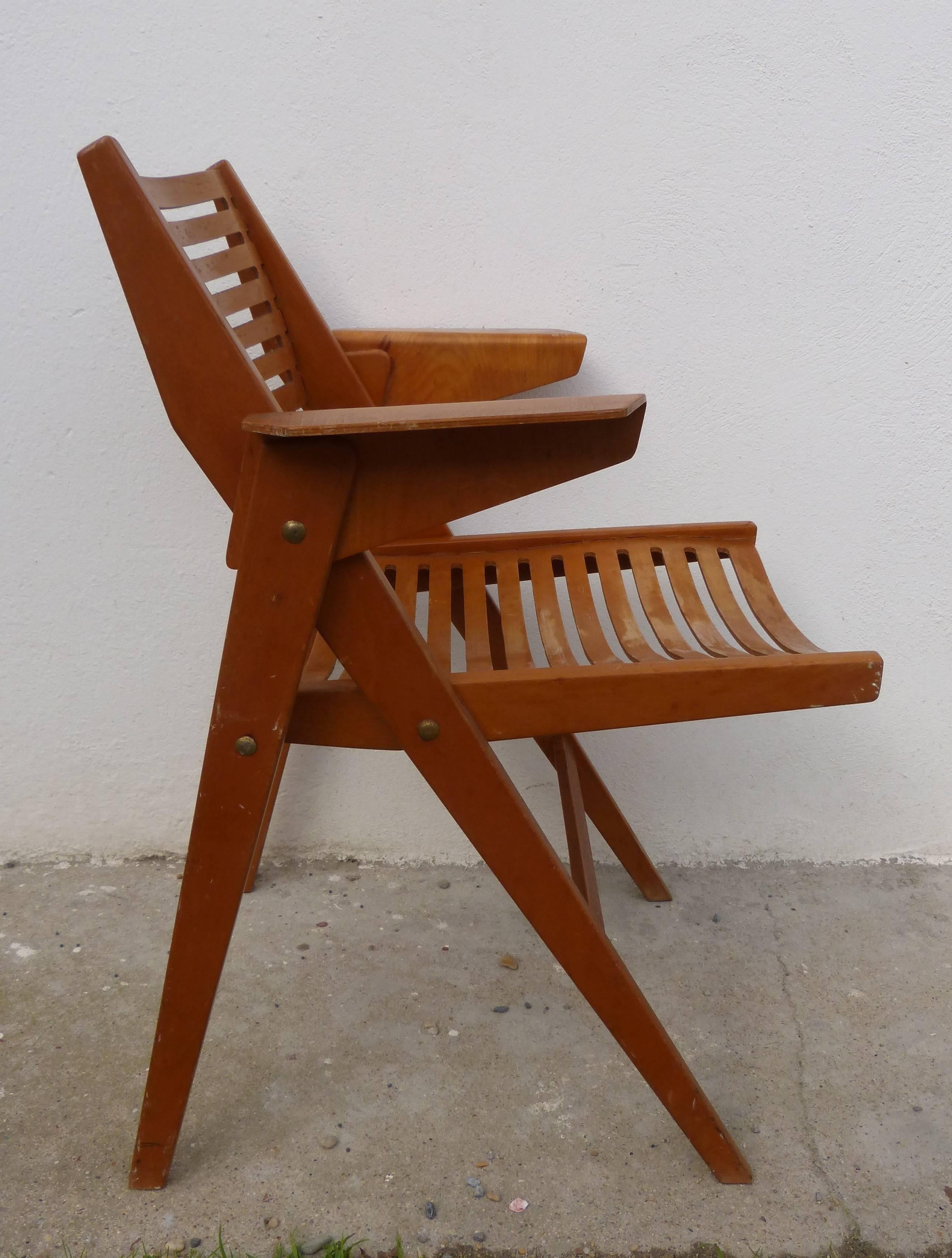 Wonderful folding chair, model Rex by the Slovenian designer Niko Kralj, manufactured in the 1952 by Thonet in France. Made of stained beechwood, all parts in an original condition and original label.