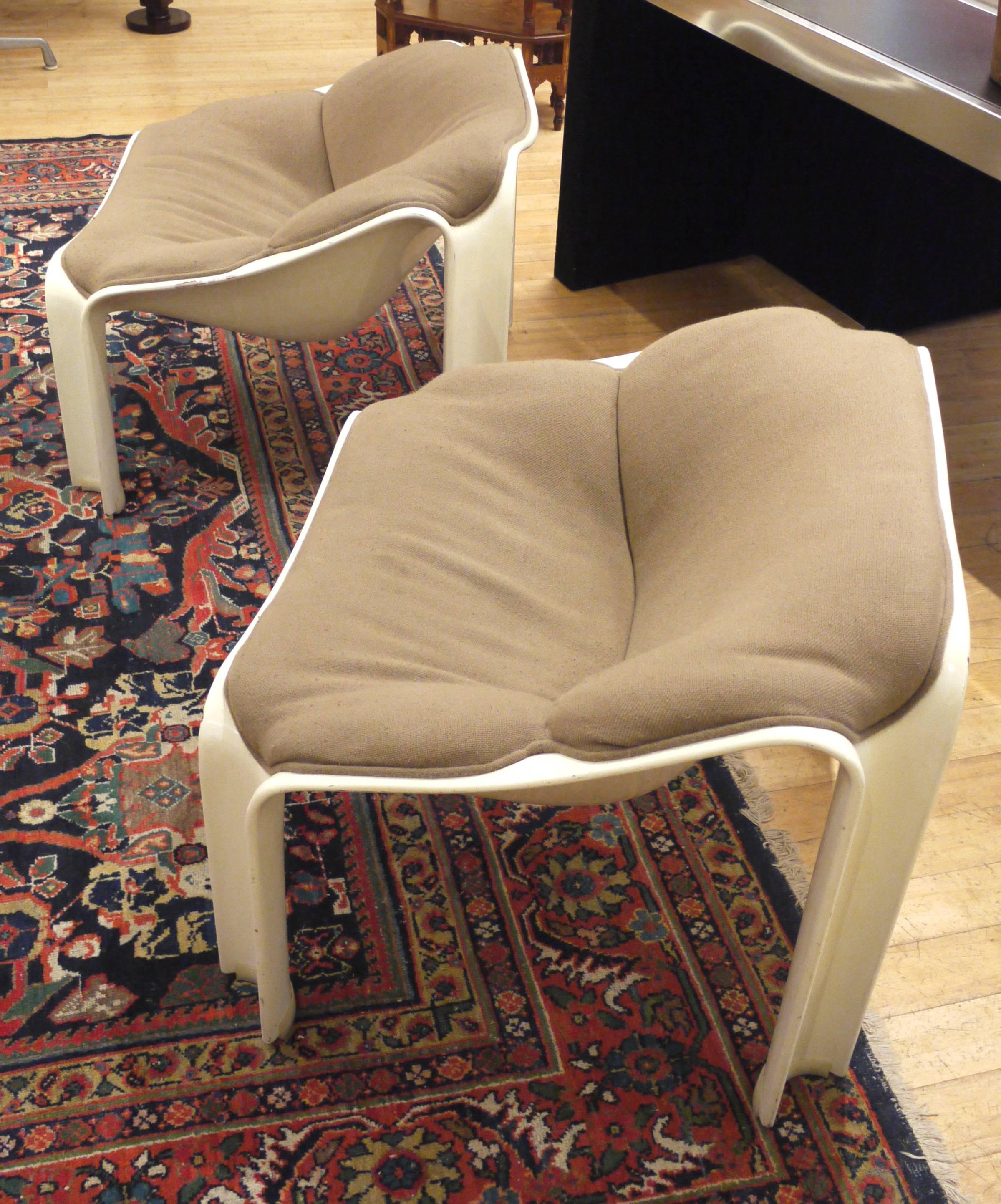 Pair of armchairs model F 300 by Pierre Paulin Artifort edition with original beige fabric (a little tear on it) see picture, but good condition. 
Original labels and stamps.
To note a few shocks on the structure see photo.
 