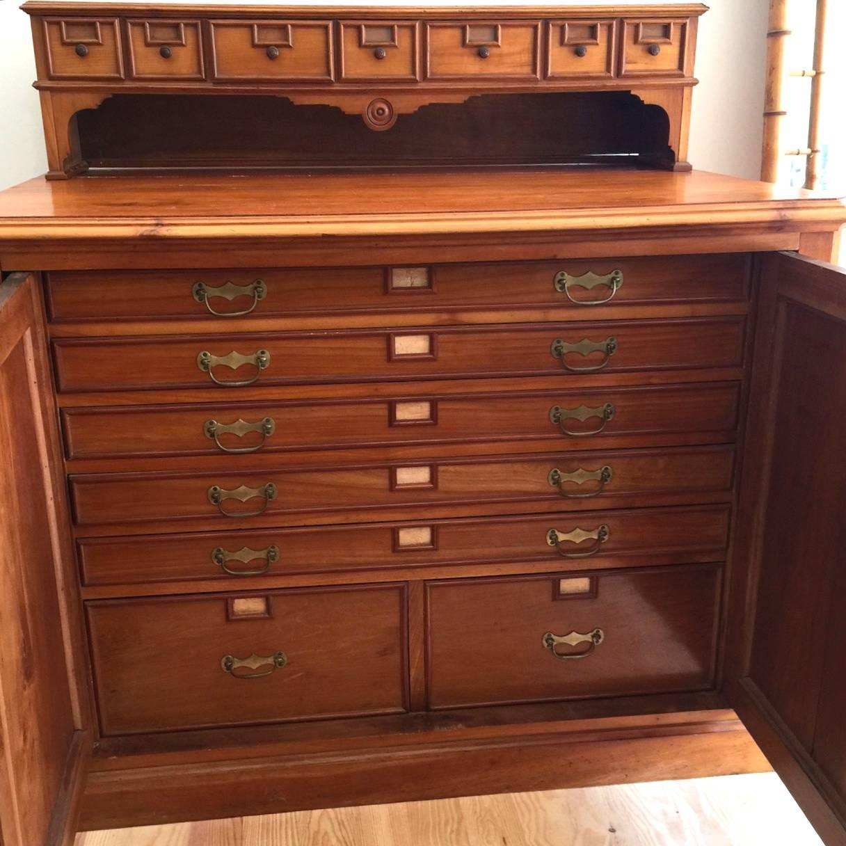 Solid wild cherrywood cabinet for plans or engraving opening by two doors with inside five large drawers for plans and two very deep drawers
On the upper part seven original little drawers,
Solid oak inside, built of poplar drawers
To note a slot