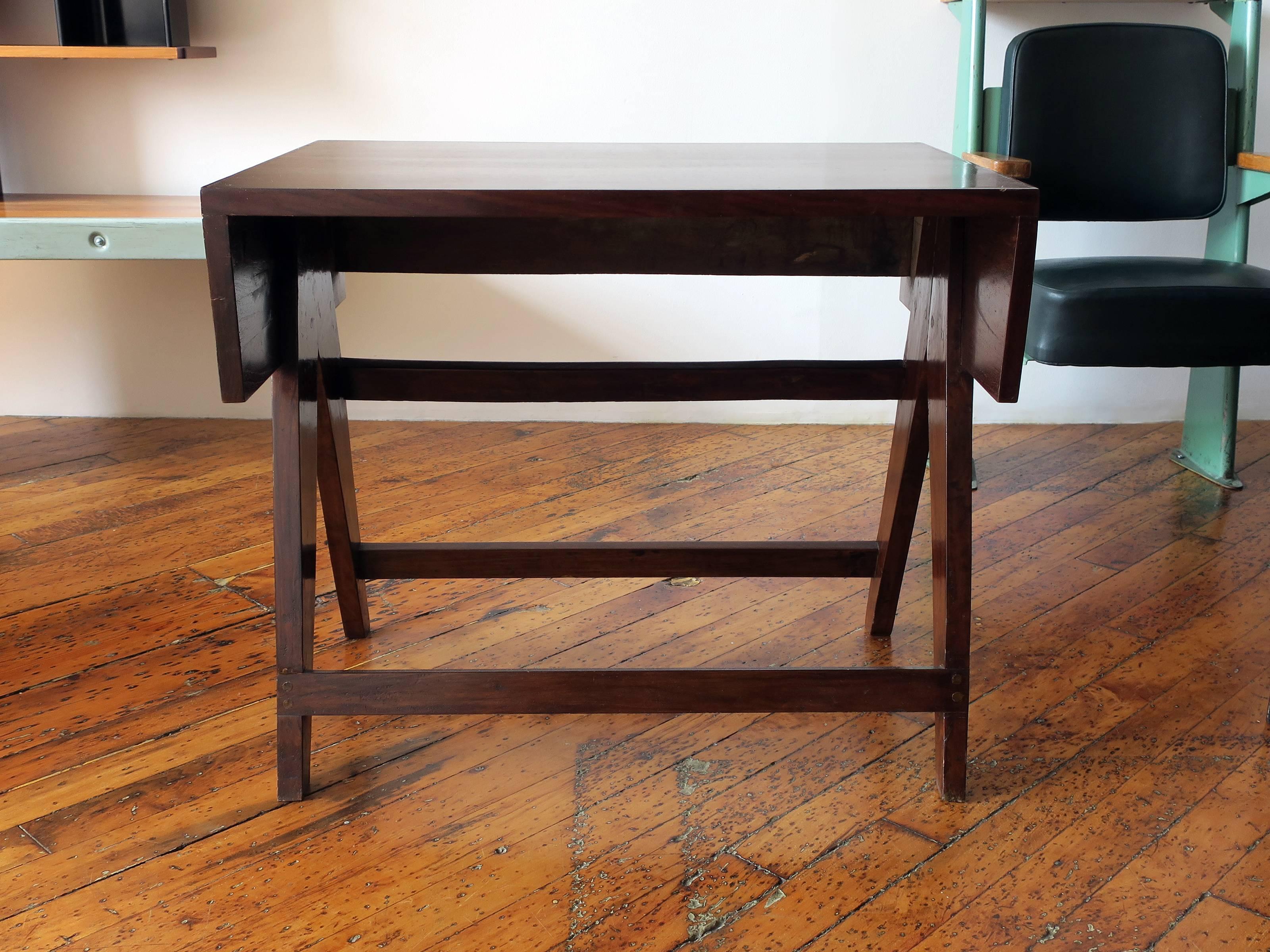 Teak student desk from the administrative building of the modernist city, Chandigarh, designed by Le Corbusier and Pierre Jeanneret. Functions well as a console.