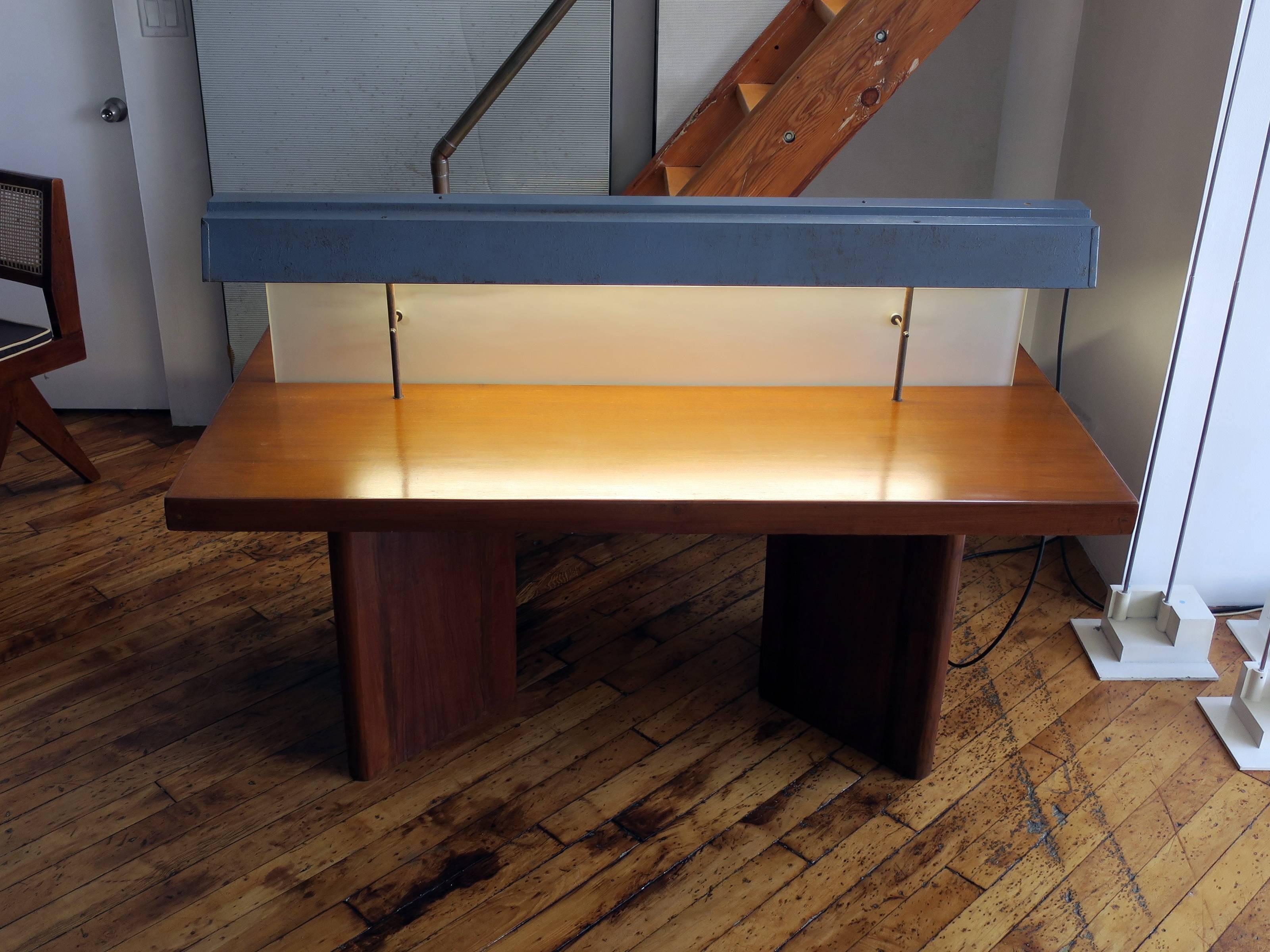 Small model of Pierre Jeanneret's teak and glass library table with light from Punjab University, Chandigarh, India.