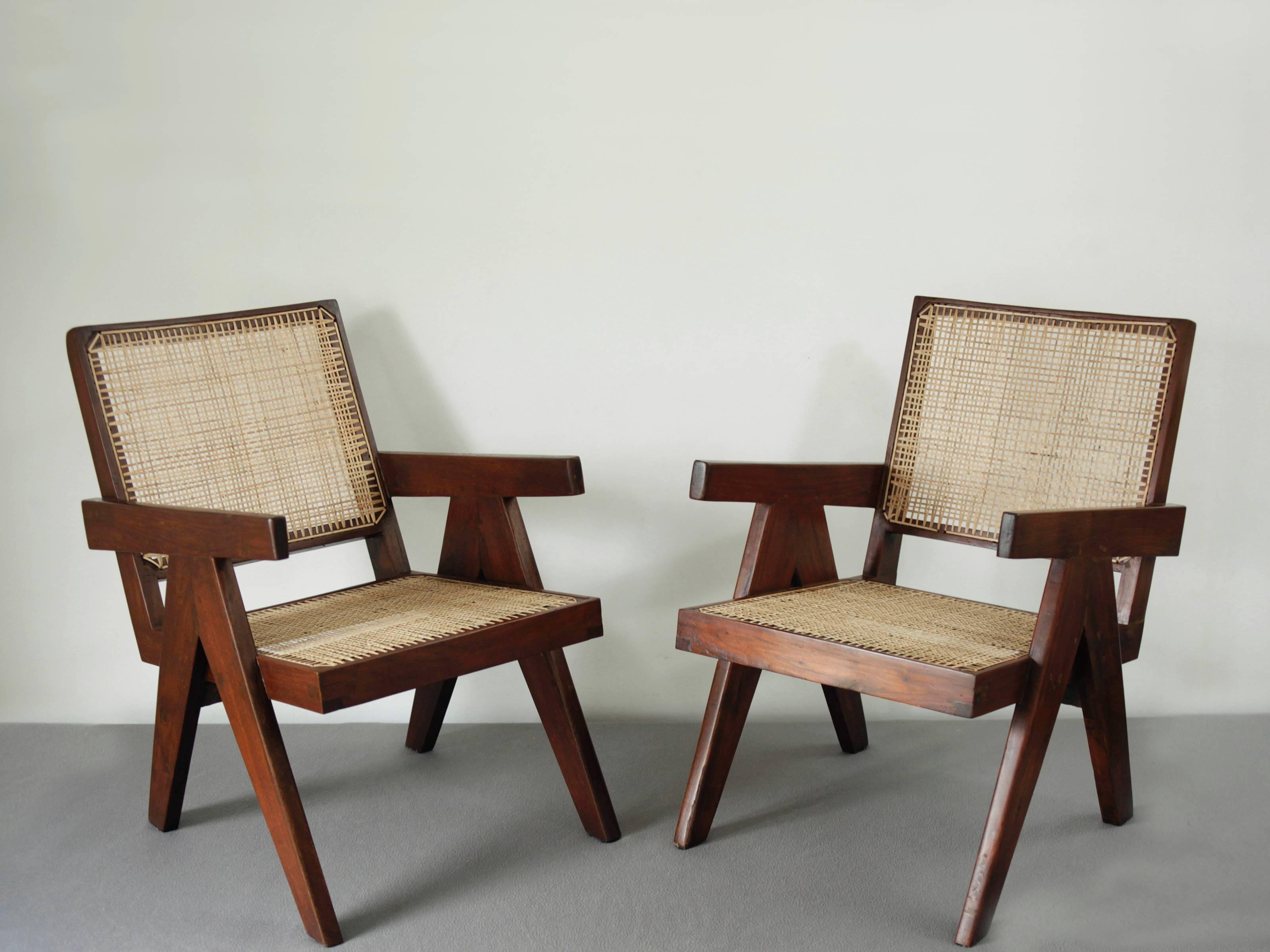 Pair of teak and cane Pierre Jeanneret lounge chairs from Chandigarh with full provenance.
