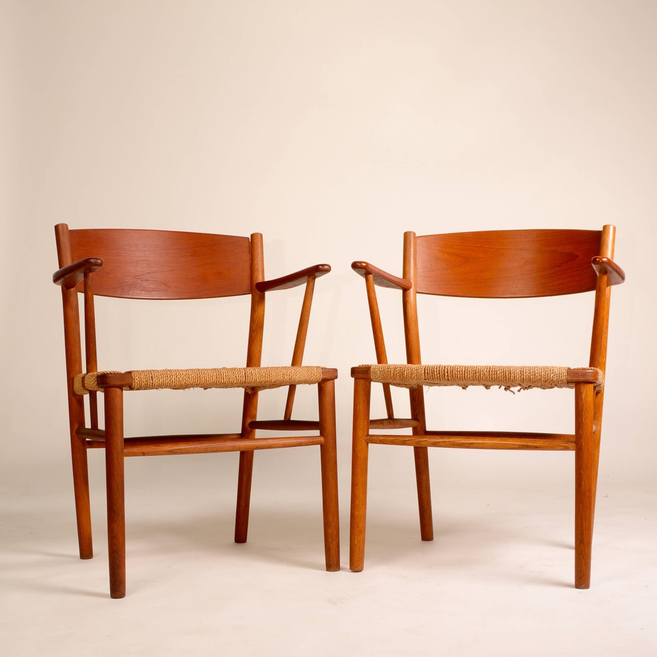 Set of two Børge Mogensen armchairs for Soborg Mobler, 1954. Made from teak backs, white oak frame and woven seagrass seats. This set includes two armchairs.