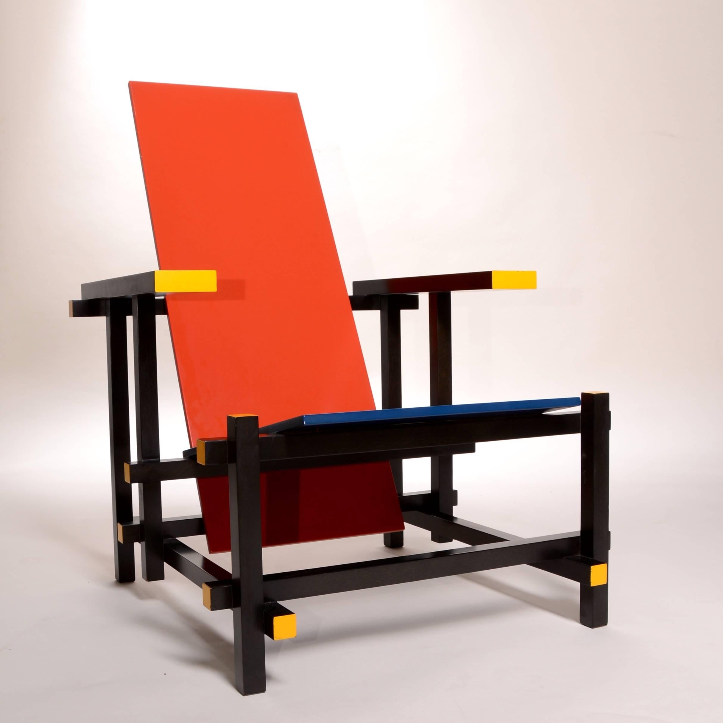 Red and blue chair by Gerrit Thomas Rietveld for Cassina, designed in 1918. This chair is from the estate of the great composer Gary Geld and is in excellent condition. Marked Cassina.