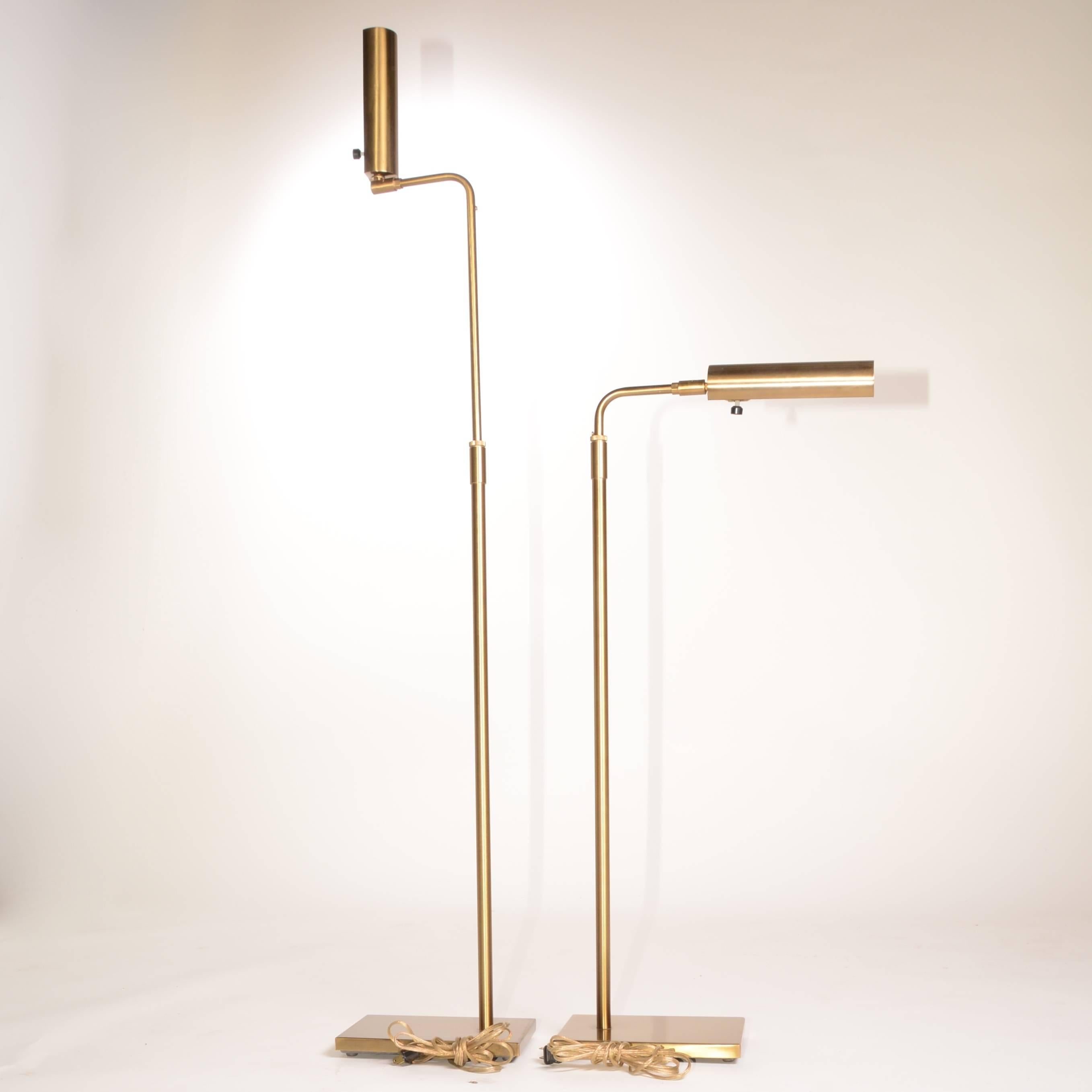 This is a pair of showroom condition Koch and Lowy adjustable floor lamps is the extremely rare brushed brass finish. Markings include Koch and Lowy and OMI.
                 