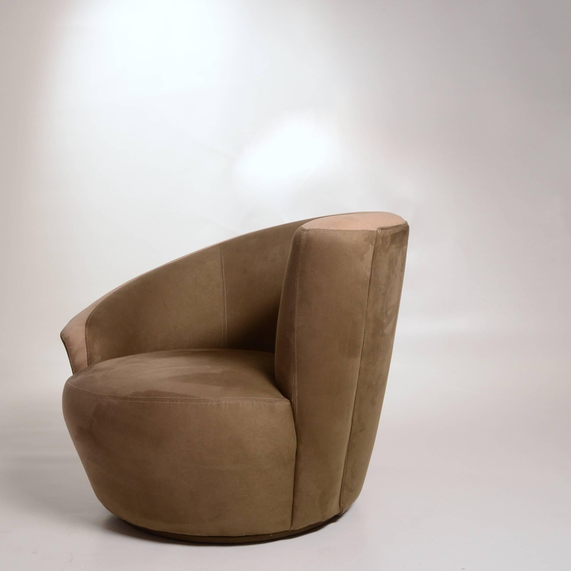 Kagan's Nautilus chair exemplifies his use of sculpture and asymmetry in contemporary furniture design. T.