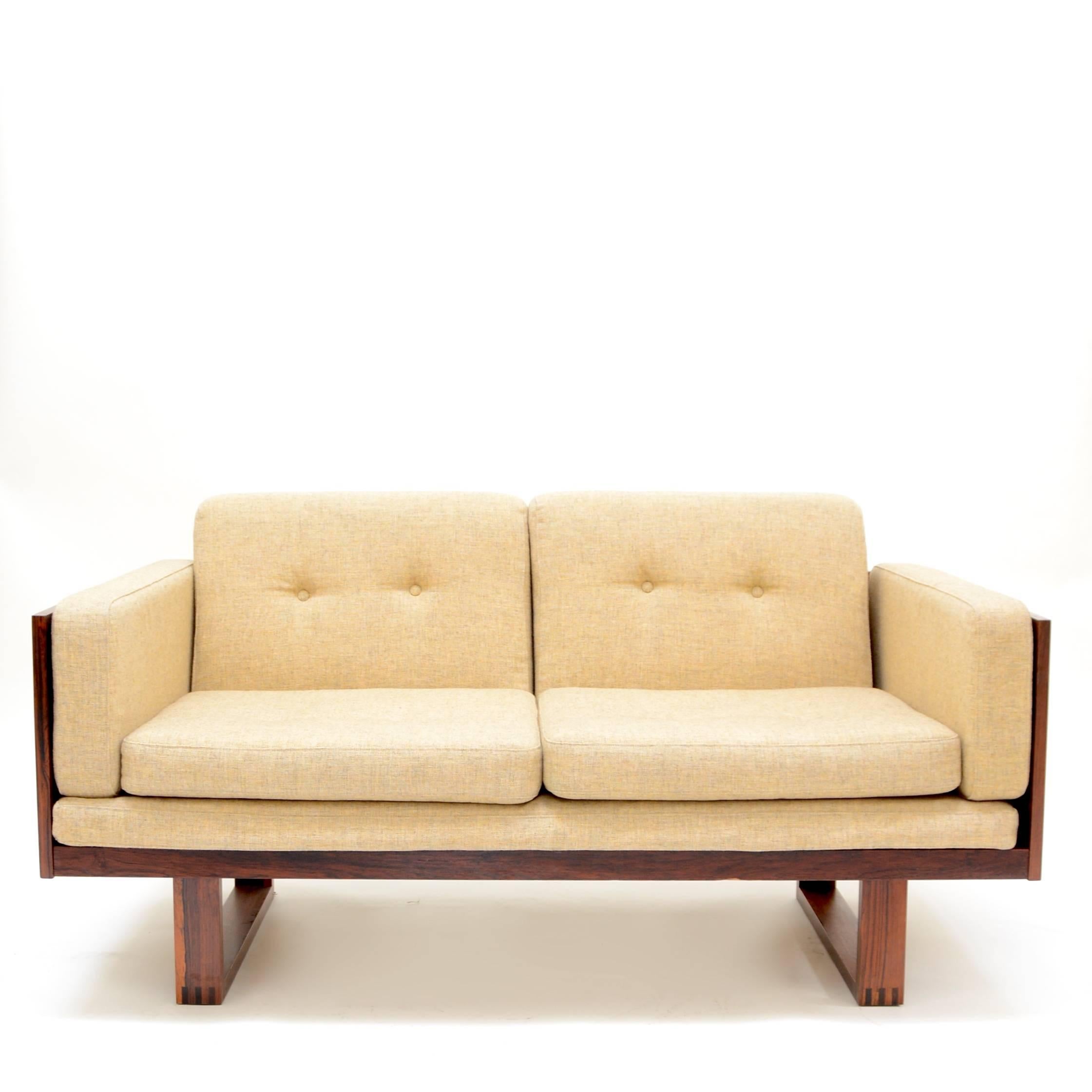 Two-seat sofa and chair set, in Brazilian rosewood by Poul Cadovius for France & Søn, Denmark, 1960s. The matching chair is also available, see separate listing.

This set is located at our downtown Los Angeles location. Please inquire for