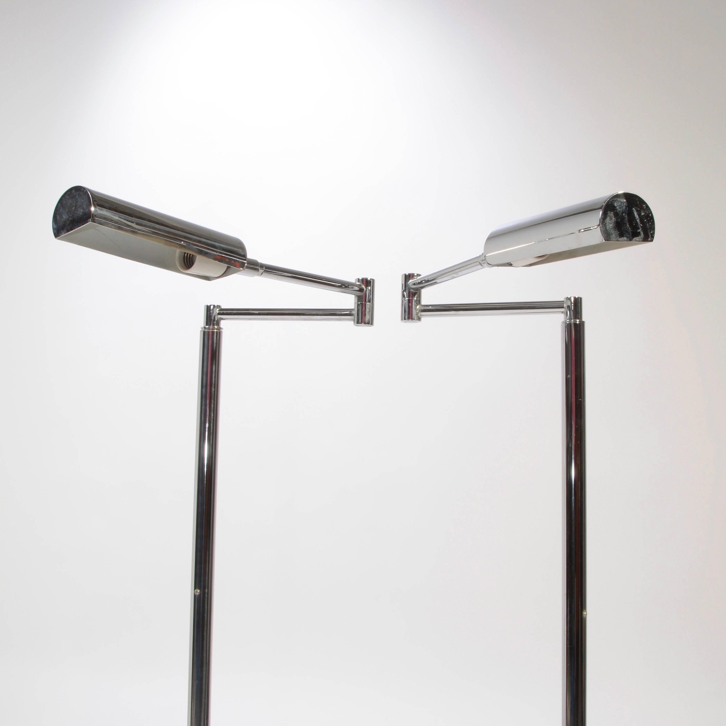 This is a pair of showroom condition Koch and Lowy adjustable floor lamps is the extremely rare brushed brass finish. Markings include Koch and Lowy and OMI.