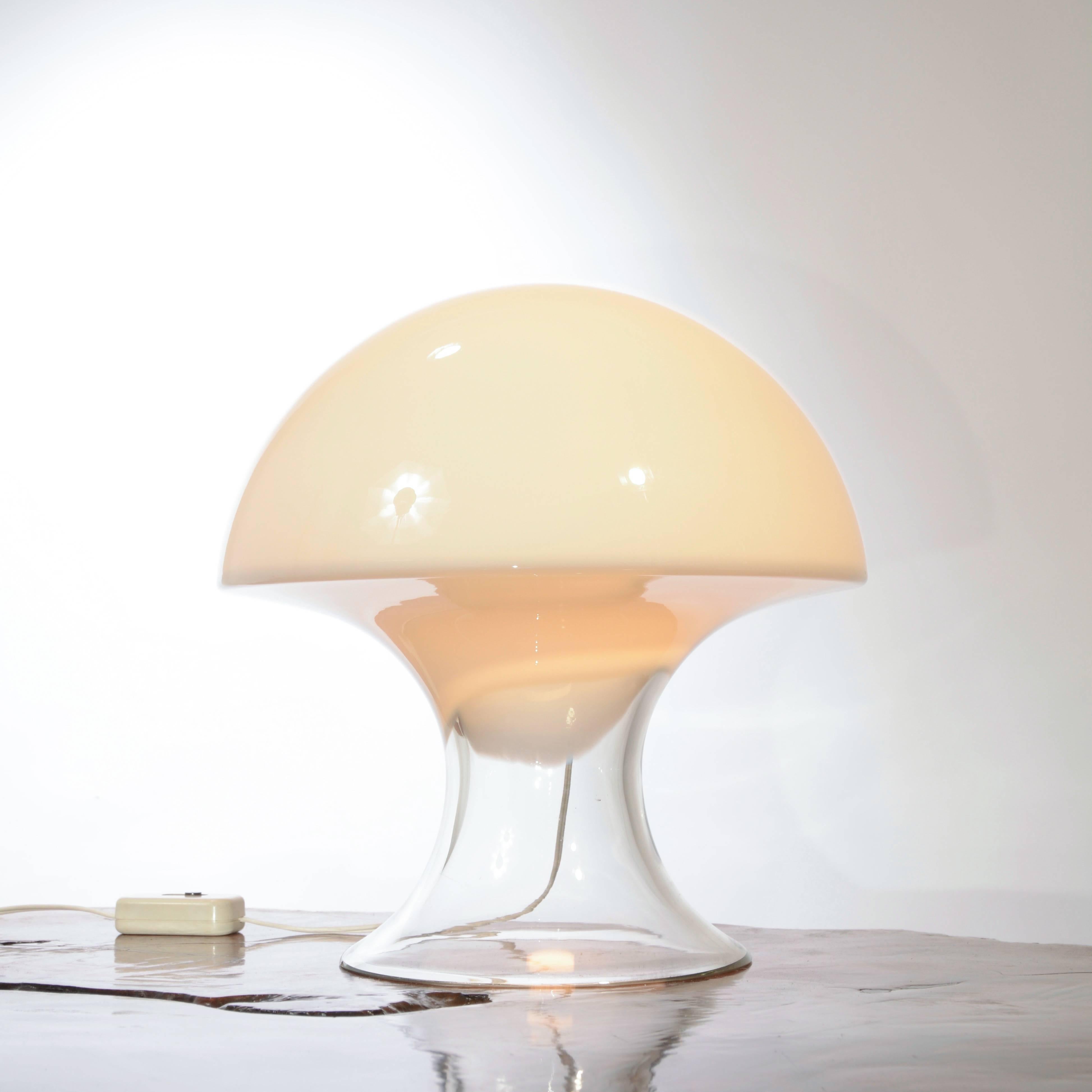 Mushroom-form table lamp with clear and white glass. Illuminated by a single bulb; switch on the cord. This item is in our Los Angeles showroom.