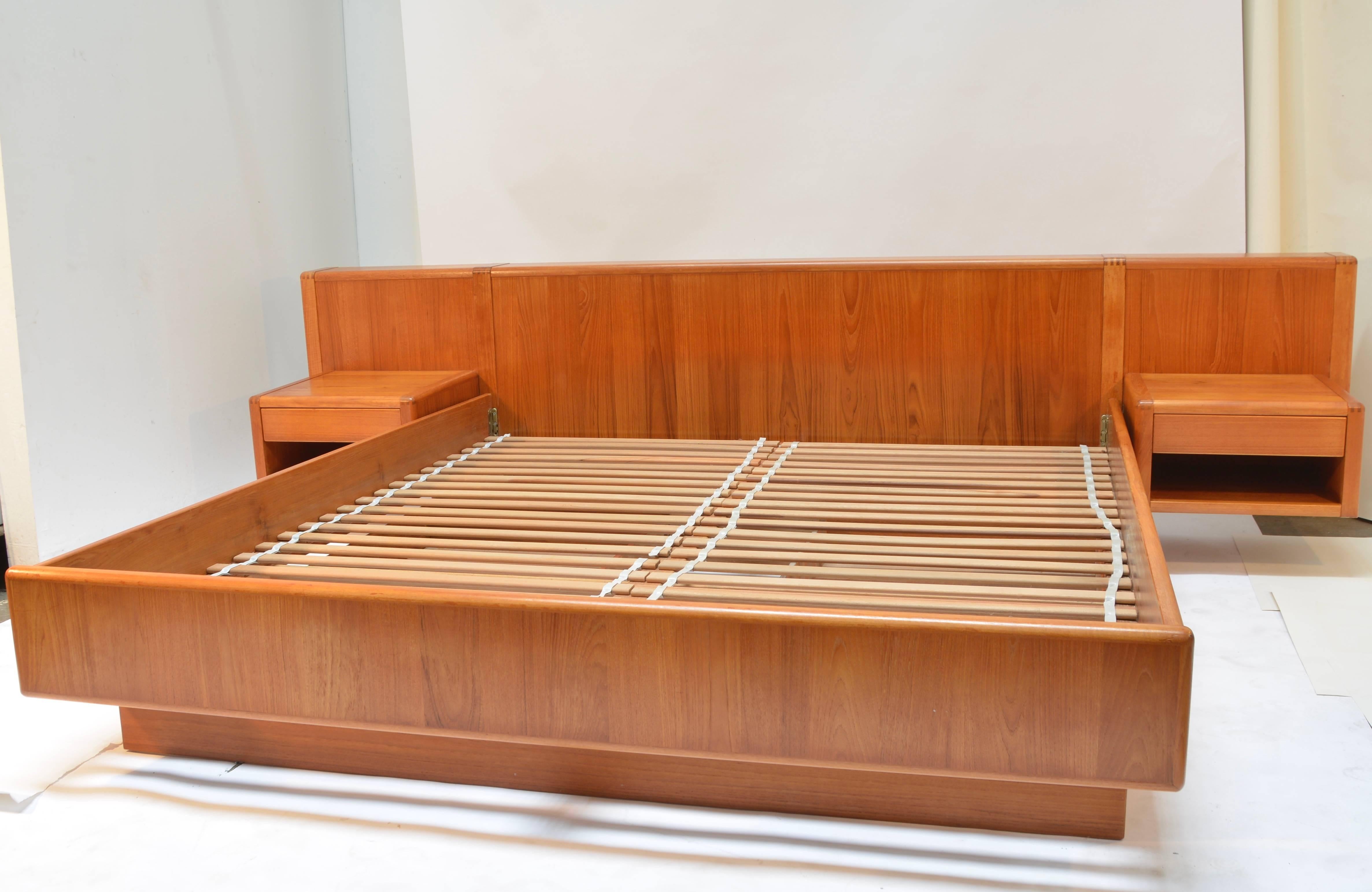 Nordisk designed 1980s teak platform beds with floating nightstands. This piece features two sliding drawers underneath the bed frame for extra storage. 

Bed size 72 Wide by 84 Long.
 