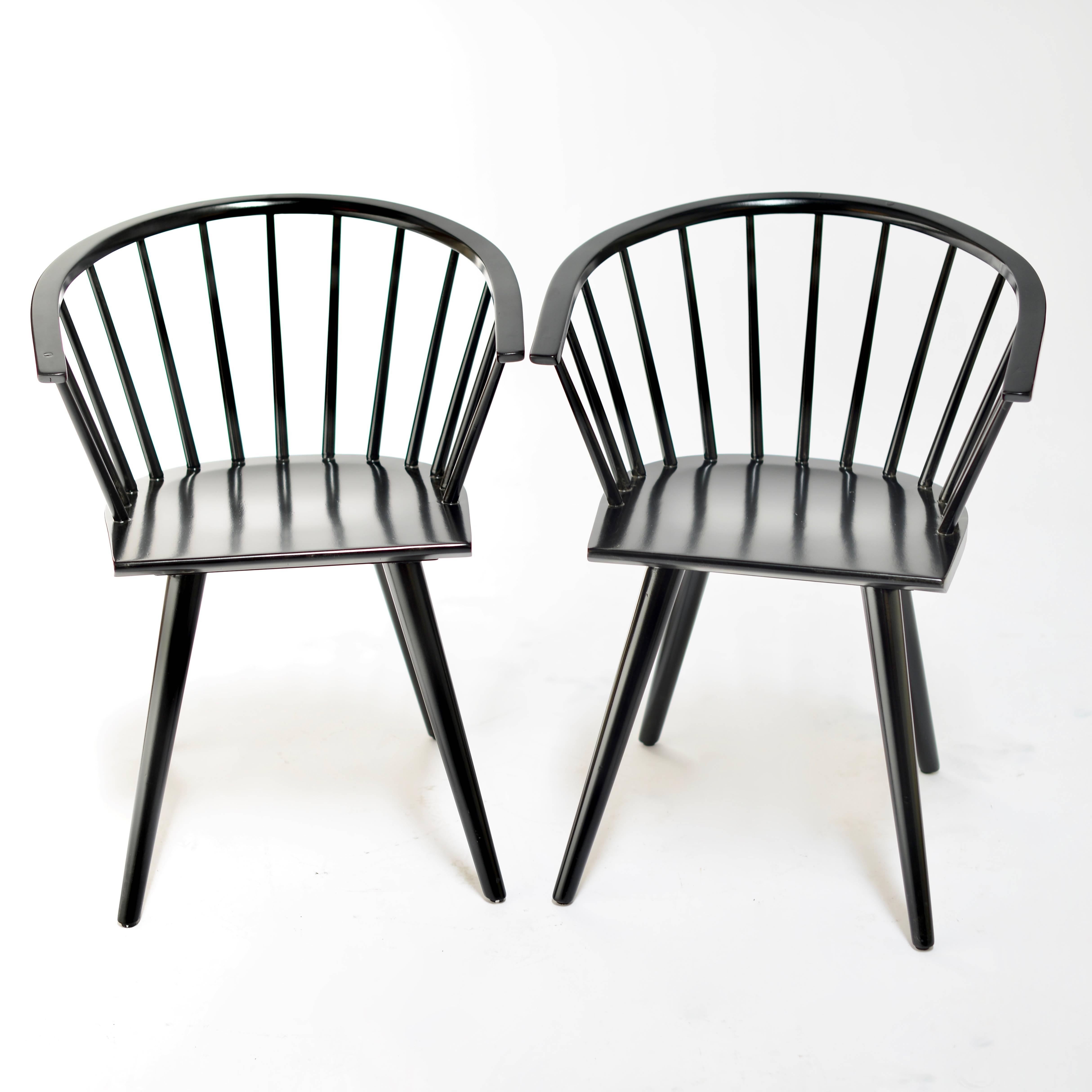 Set of two Windsor inspired chairs by Russel Wright for Conant Ball Company. Newly refinished in Ebony.
 
