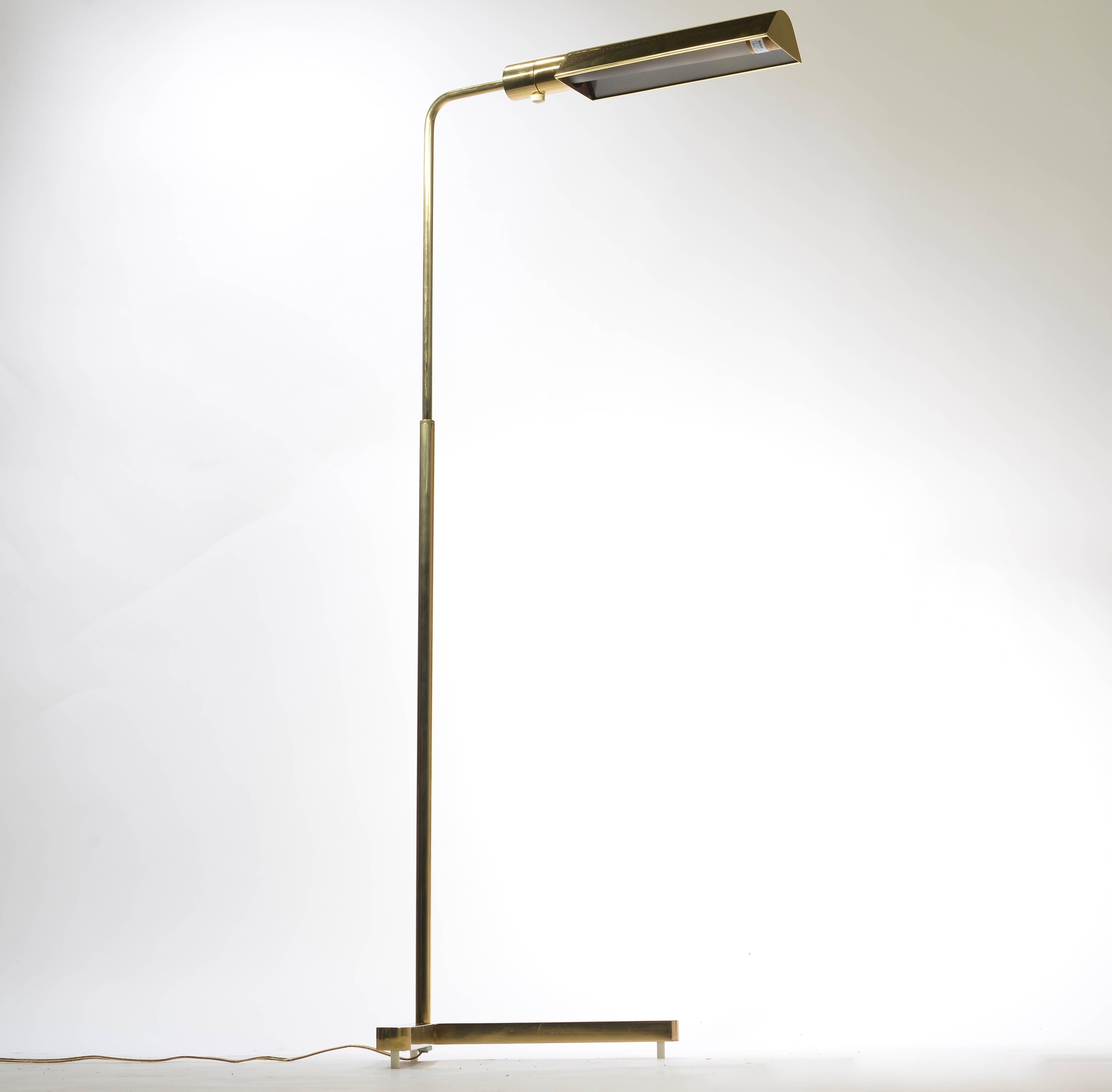 Polished brass finish by Casella Lighting, circa 1980s. The lamp is multi-directional.  In excellent condition.