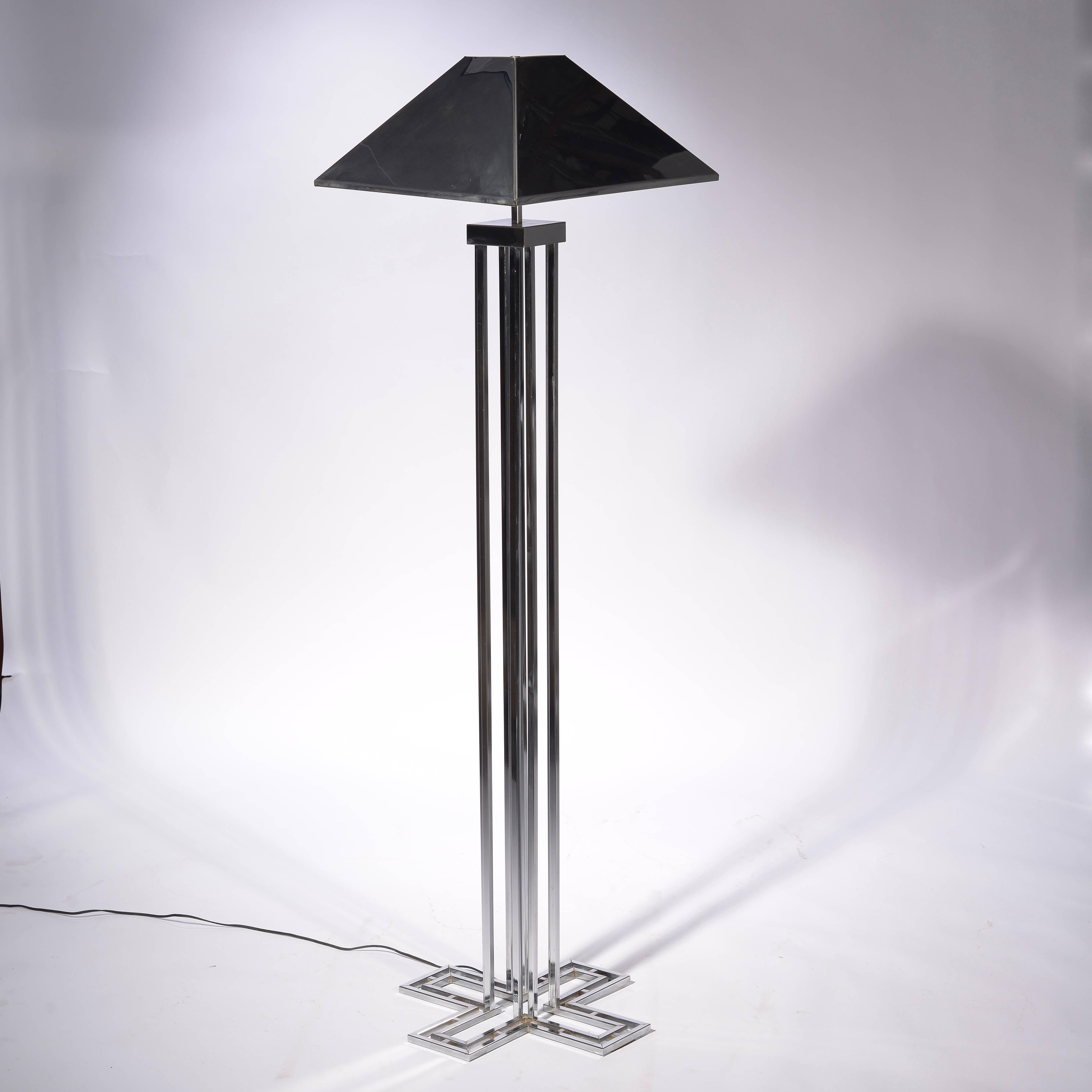 A Curtis Jere chrome floor lamp, signed on the base and the shade.