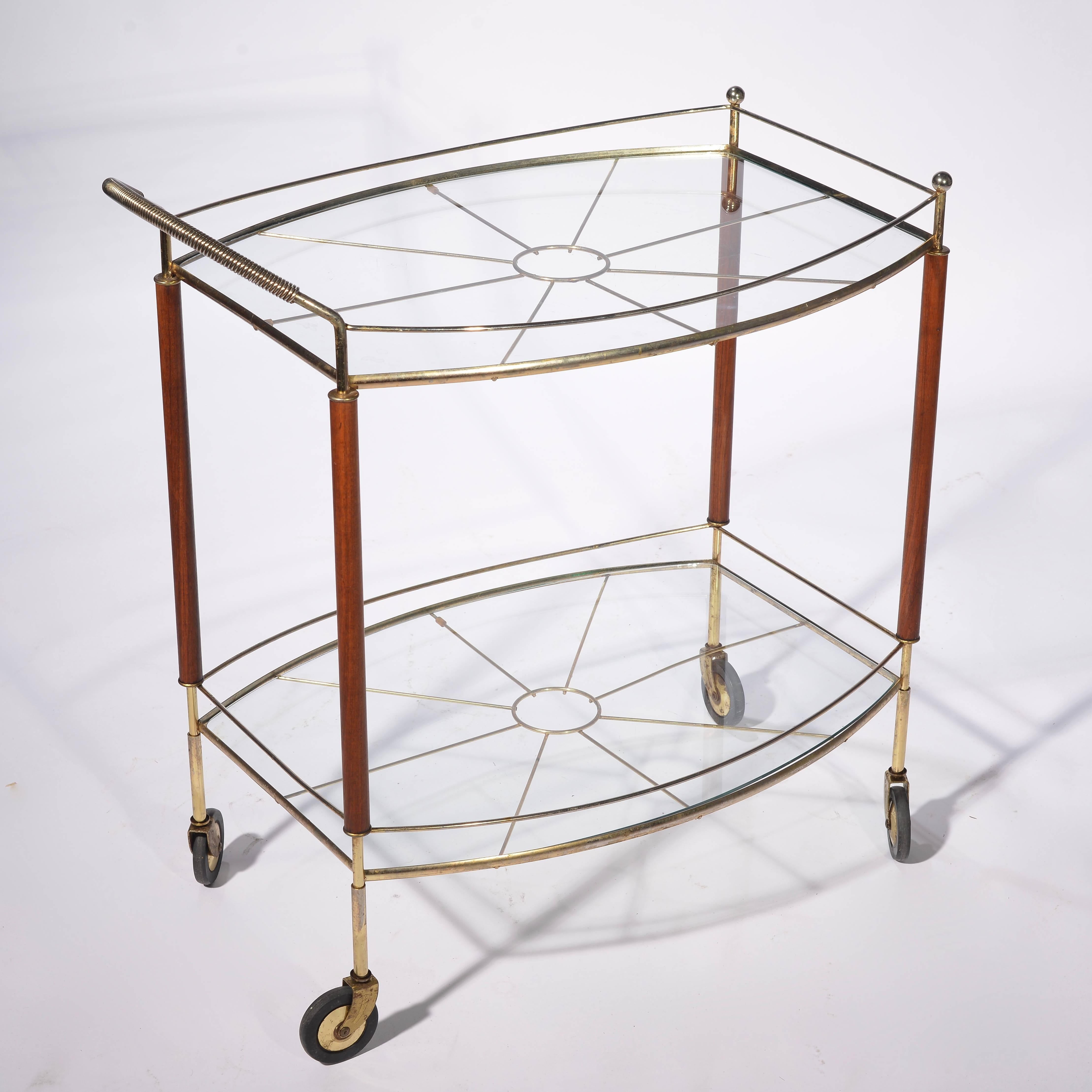 Midcentury Italian bar cart in good vintage condition.