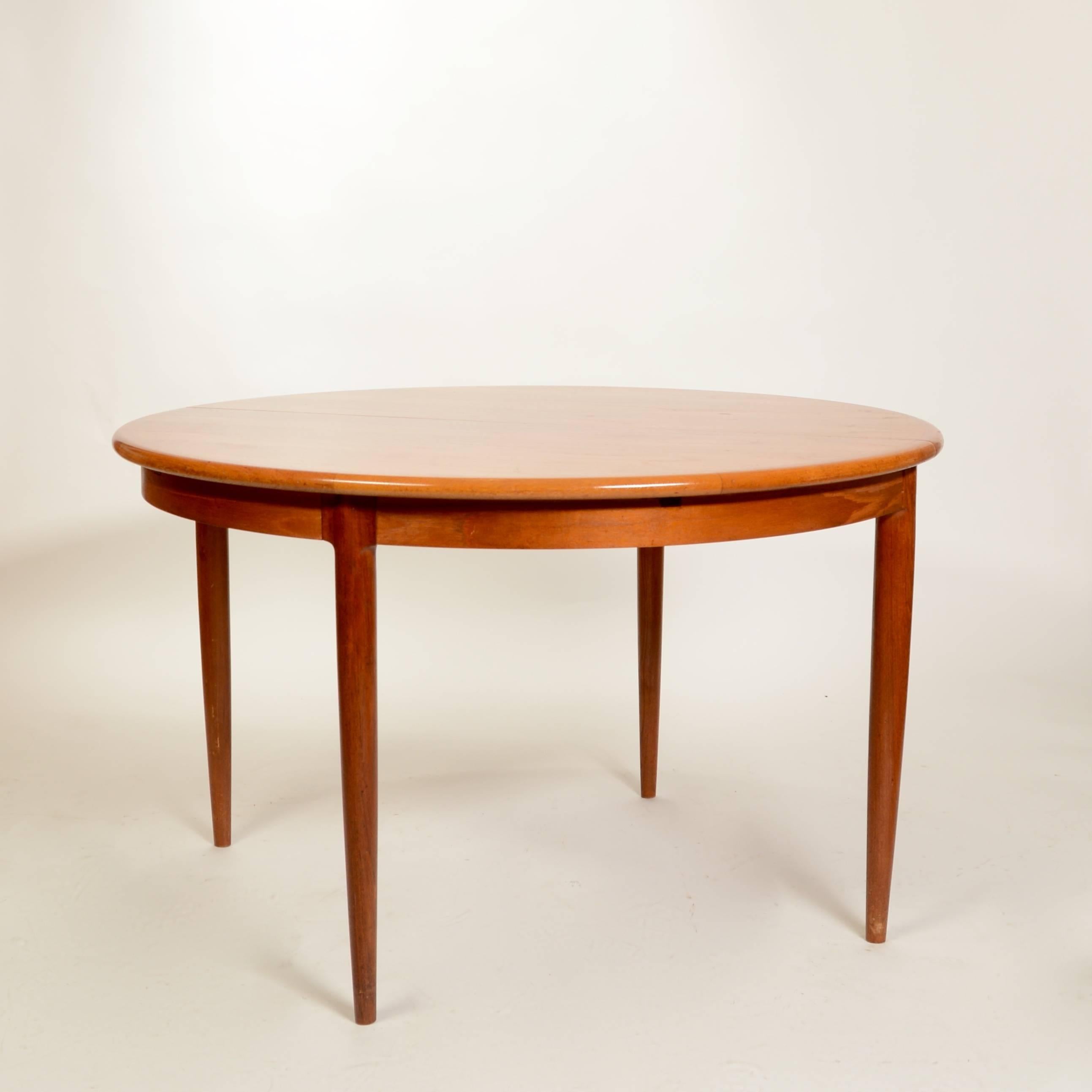 Niels Moller for J Moller #15 dining table in Teak.  The table is in great condition and beautifully selected teak veneer.  The 20