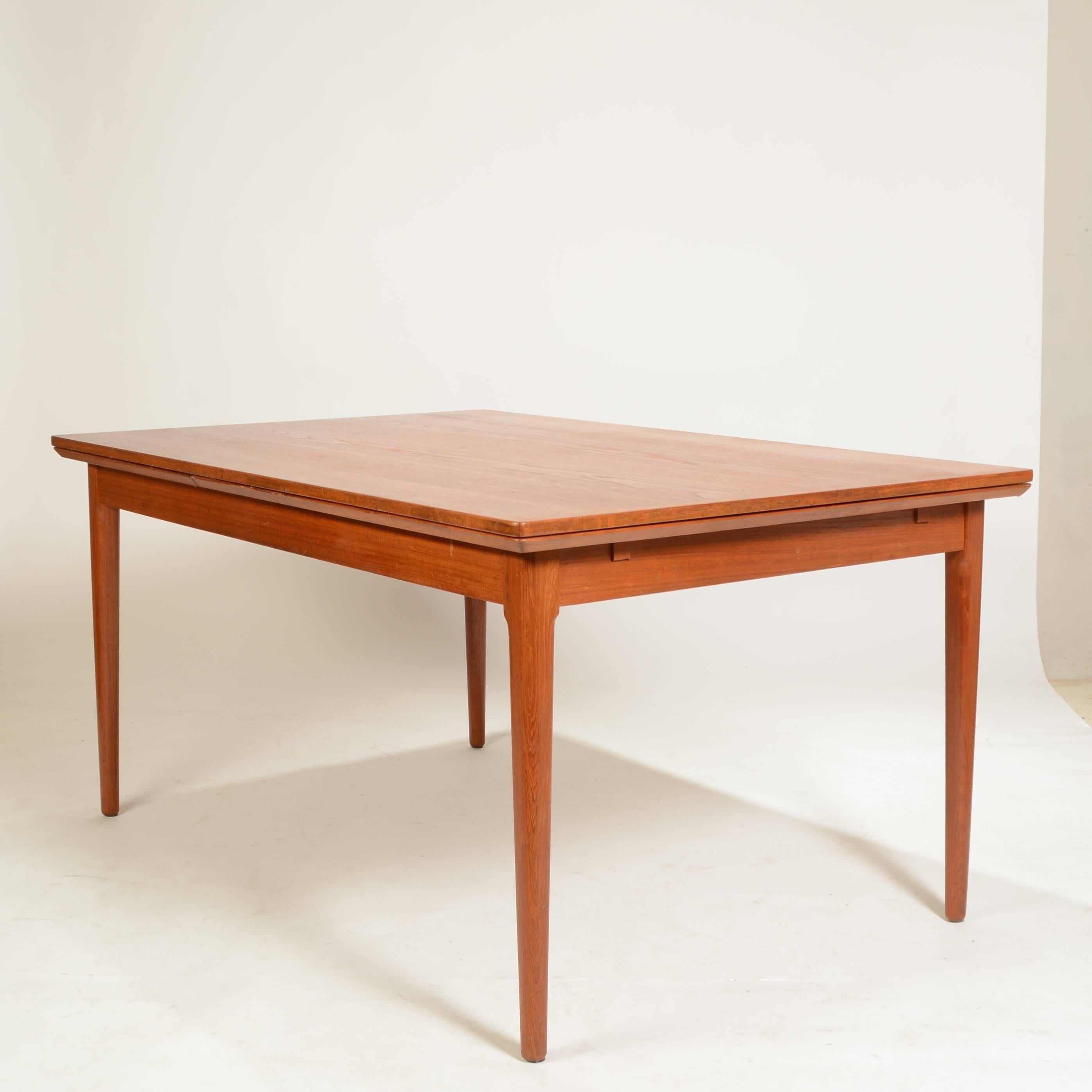 This is a very large and beautiful danish modern dining table by L&F Mobler.  This table is in excellent vintage condition.  