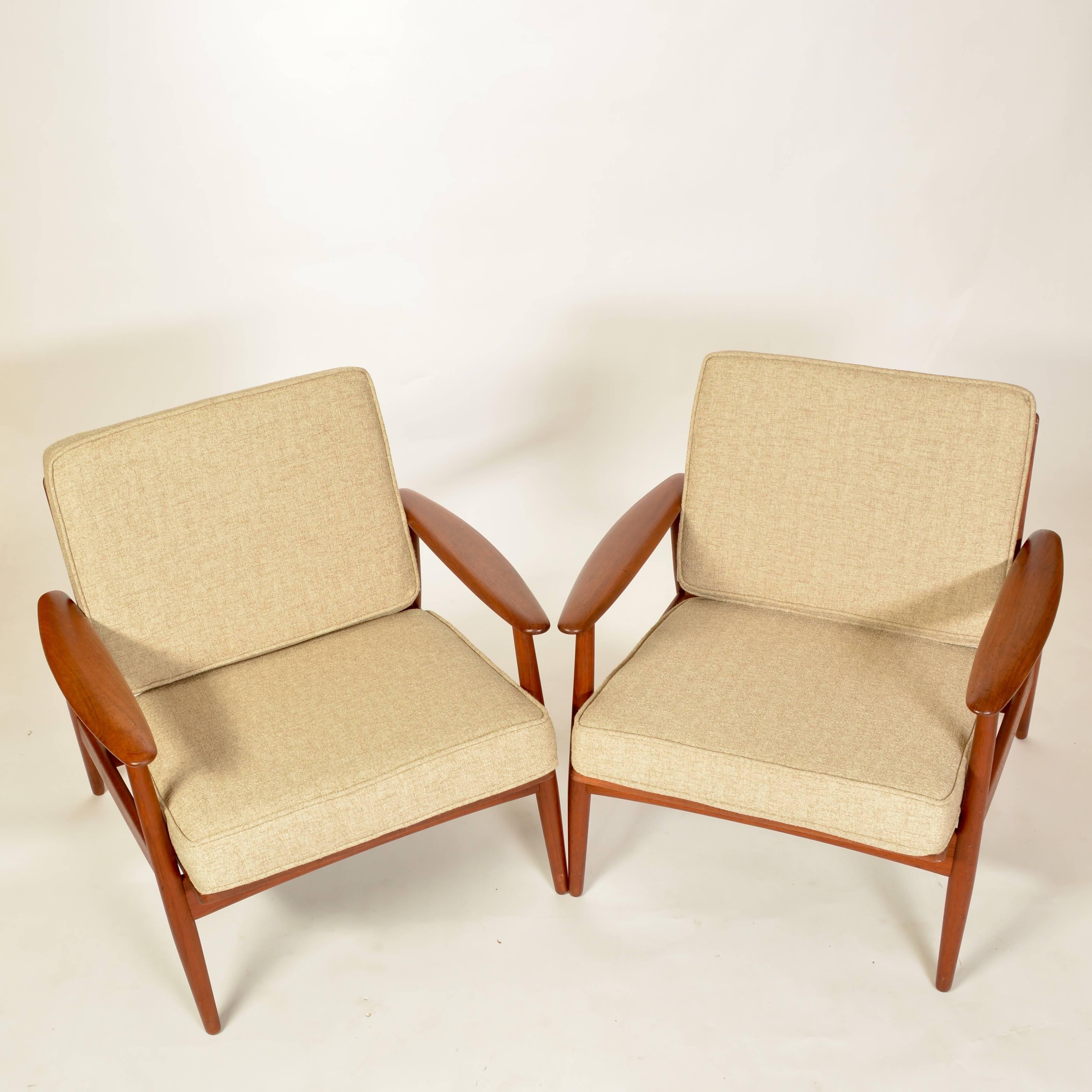 This is a great set of early danish modern lounge chairs attributed to Grete Jalk for Moreddi.  This set is available with the new cushions pictured or without cushion.  Please inquiry for prices without cushions.   