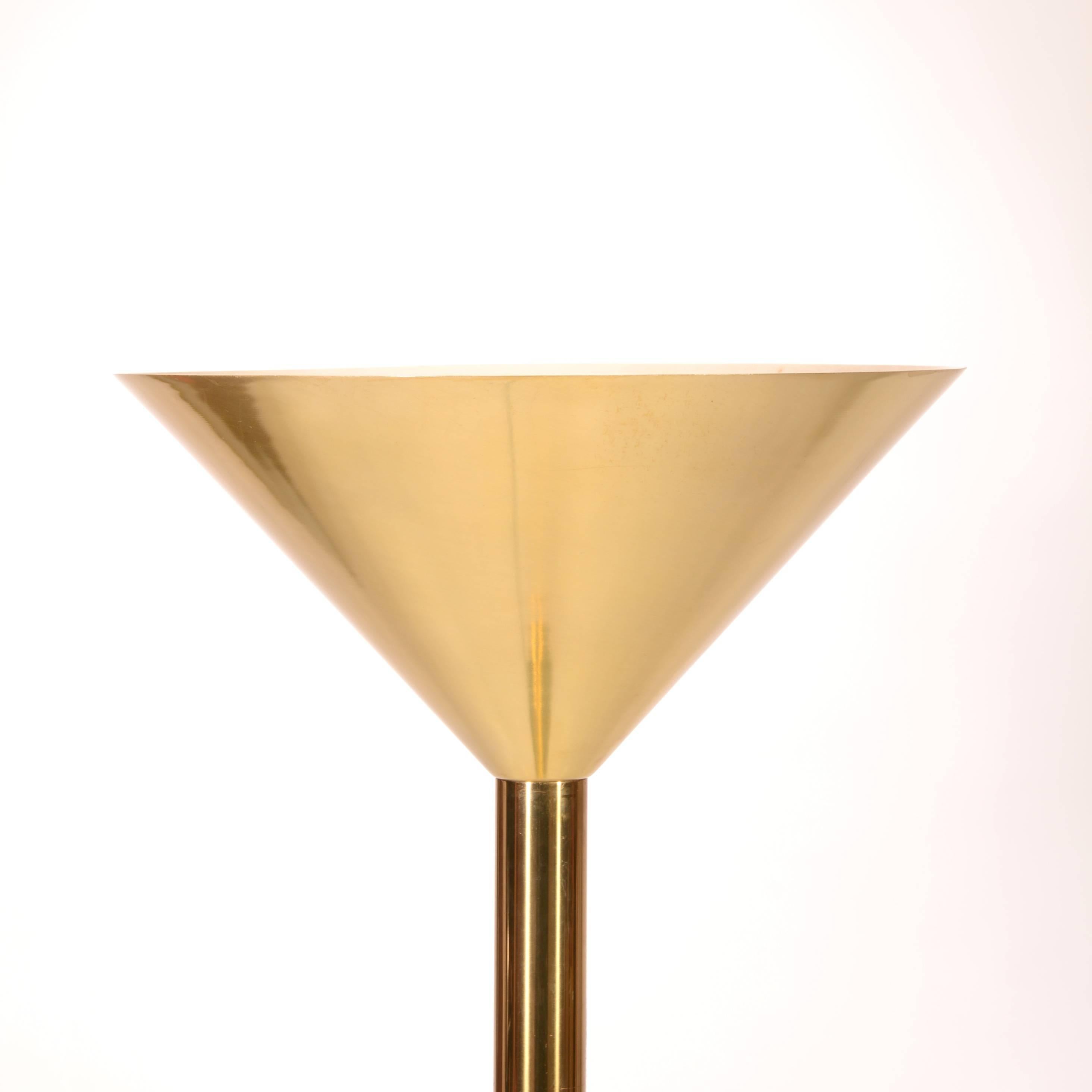 This is an amazing 1970's brass floor lamp by Nessen.  