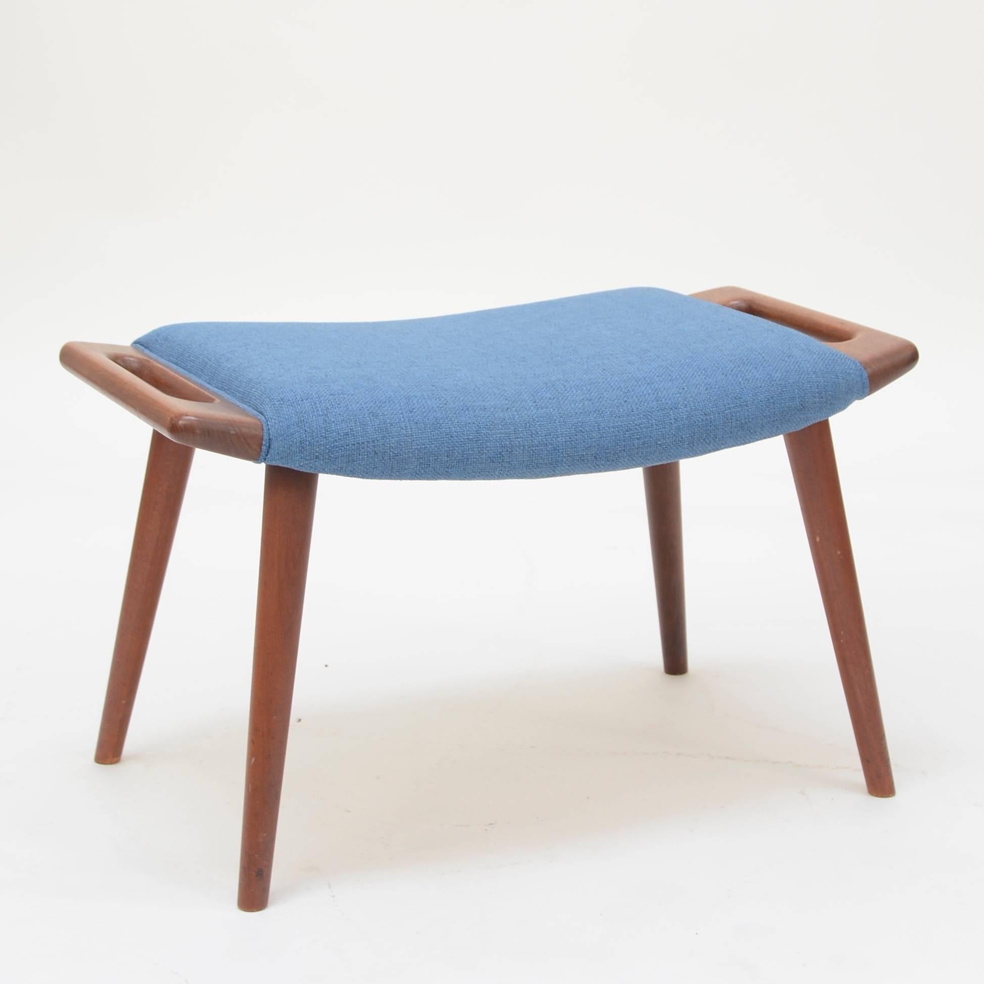 Original 1950s solid teak stool with handles on each side on tapered legs. Stamped on bottom. Made by A.P. Stolen.