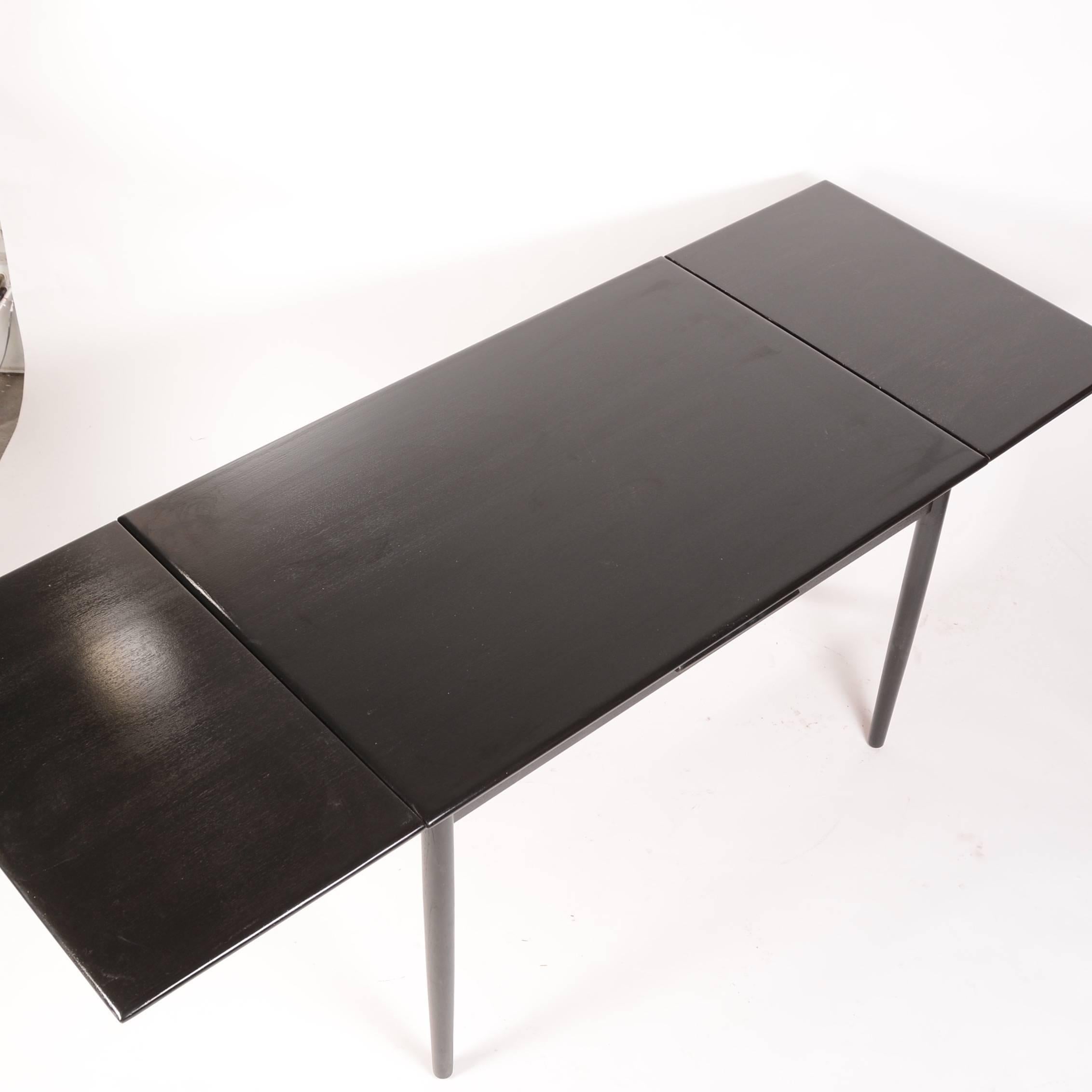 Danish Modern Draw-Leaf Dining Table in Ebonized Teak In Excellent Condition In Los Angeles, CA