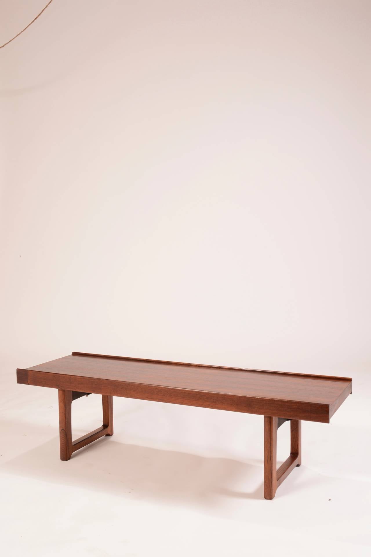 Rosewood bench designed by Torbjo¨rn Afdal for Bruksbo Møbler, Norway. This piece has been professionally restored to its original condition.