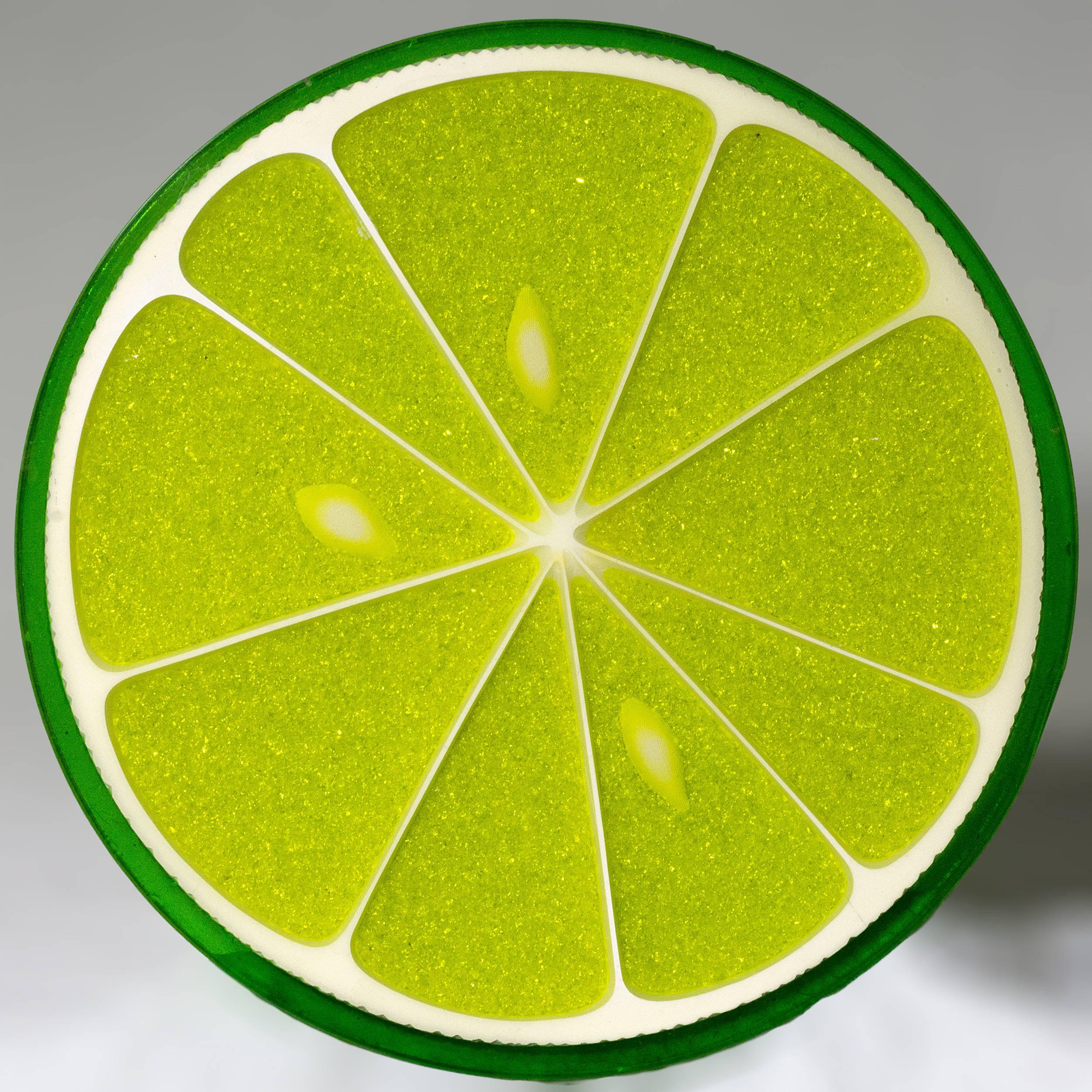 A citrus slice table by Carl Chaffee, circa 1970.
A realistic lime slice in resin with crushed glass
pulp and white ceramic seeds and pith.
The trompe l’oeil top raised on a cluster of 12
rubber tipped chromed steel rods.
    