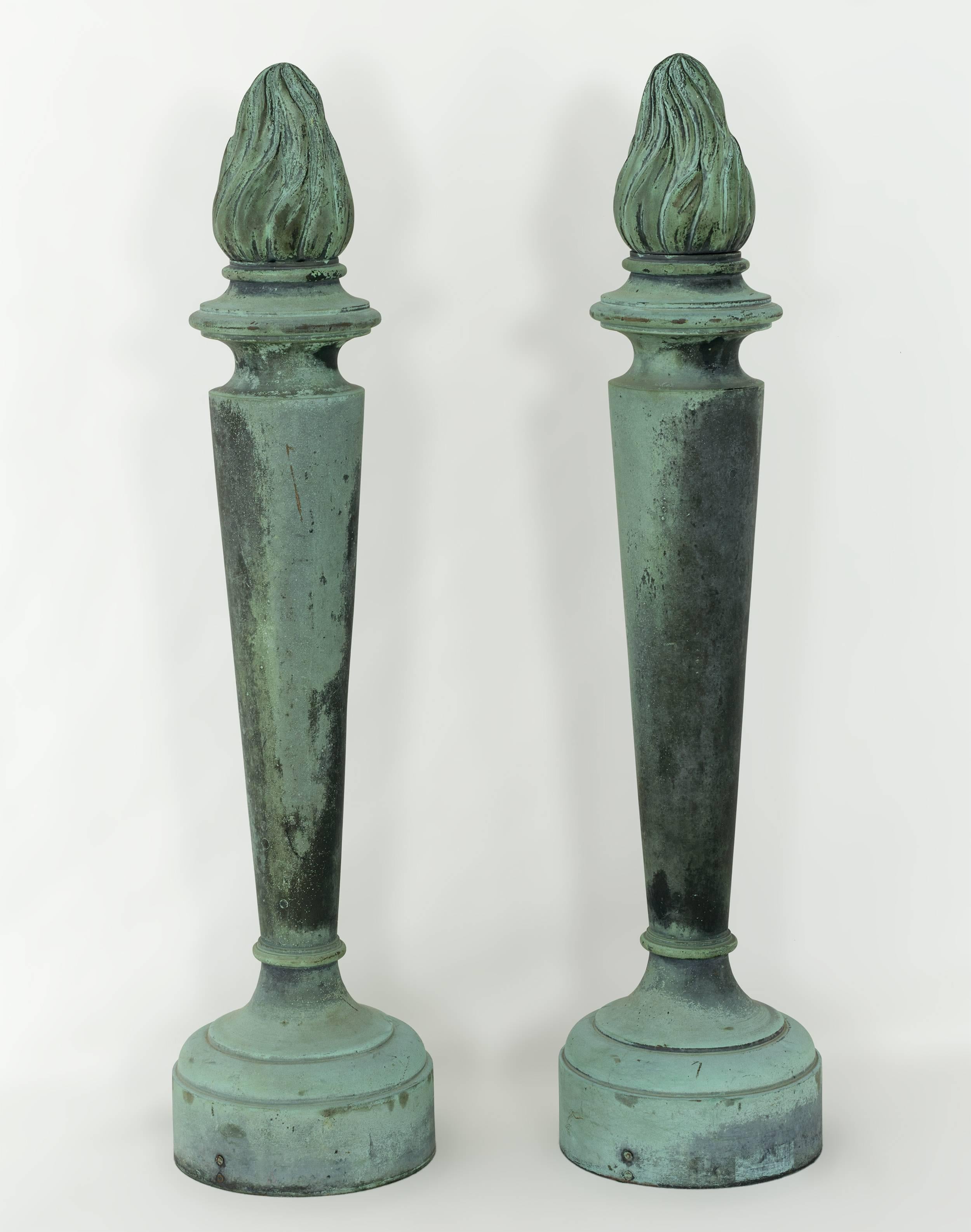 Solid bronze with natural aged verdigris surface.