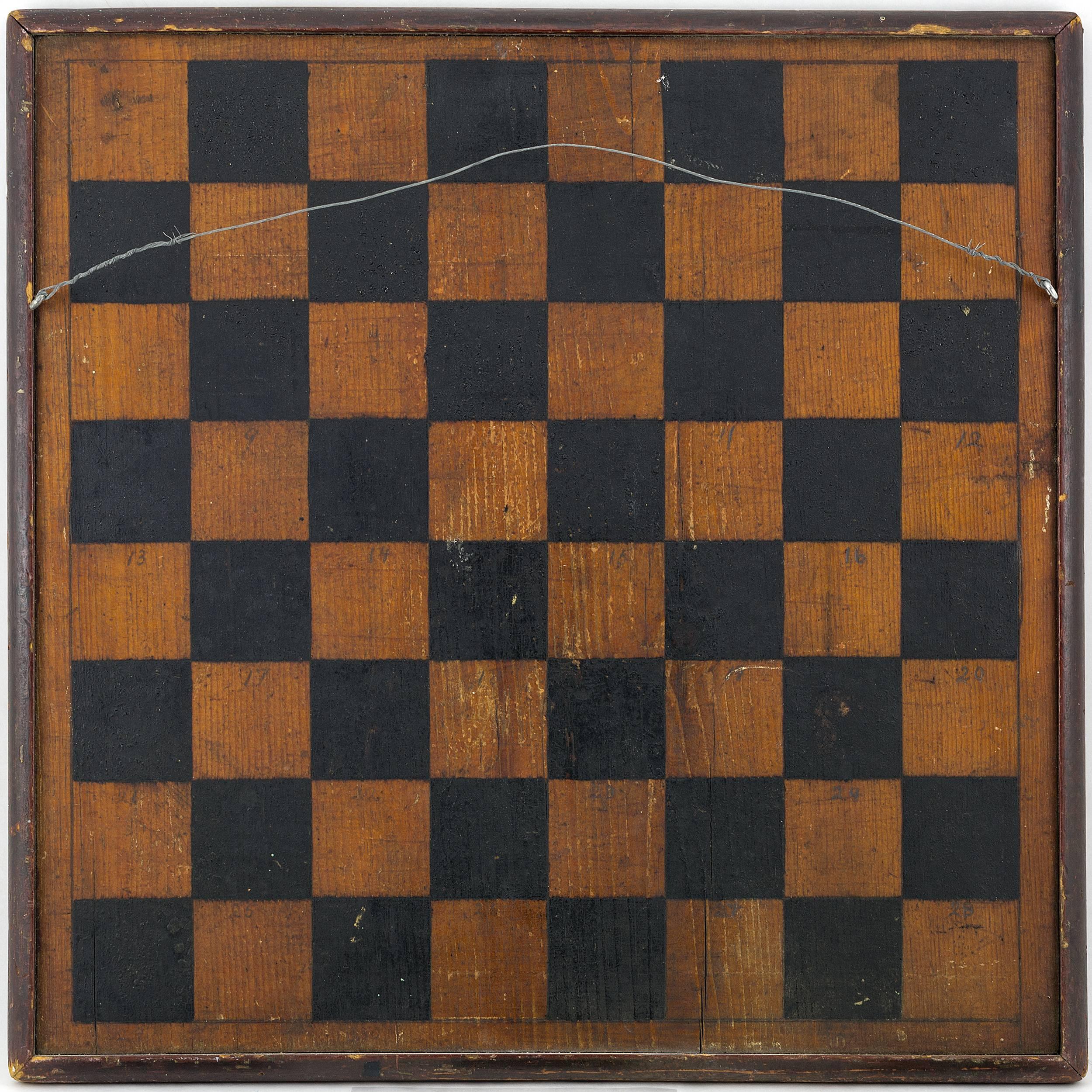 The Parcheesi side has multicolored painted pinwheel corners with mother-of-pearl inlay at the home space, the checker side has black painted checks
Made of a solid piece of white pine with a painted molded edge.