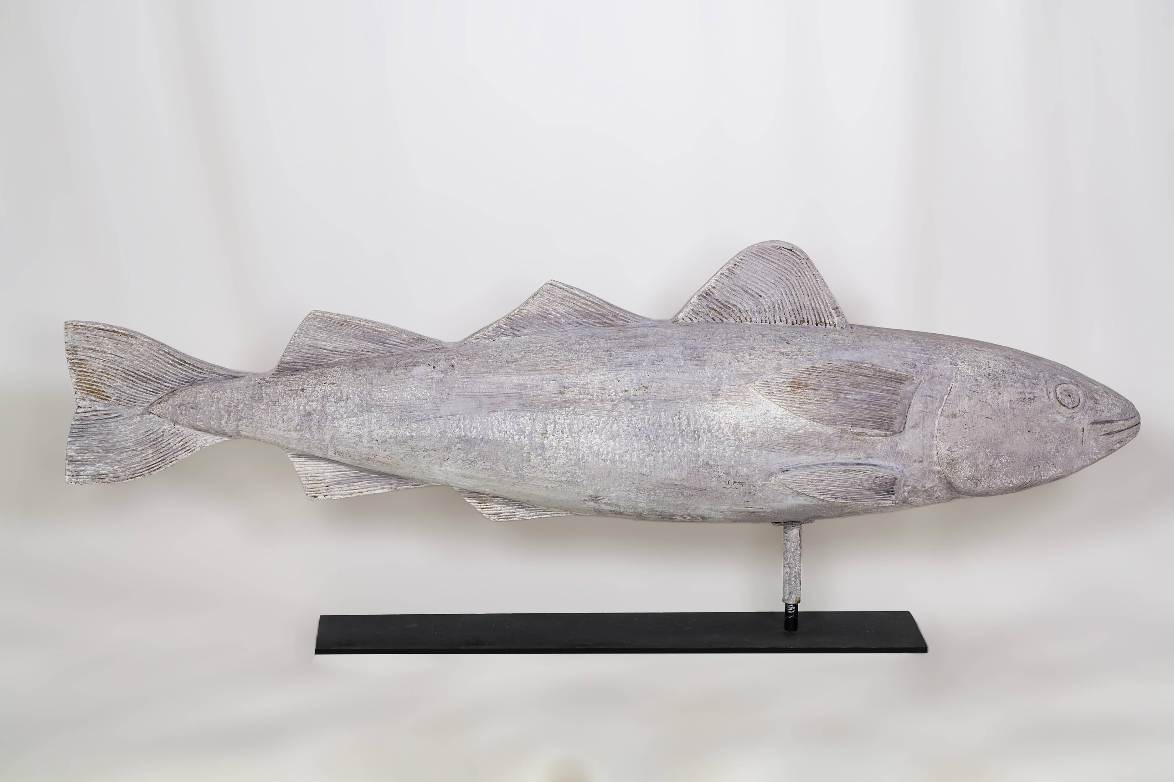Wooden fish weathervane, hollow carved made of Pine and carved incised fins with a grey weathered surface
American, circa 1940.
  