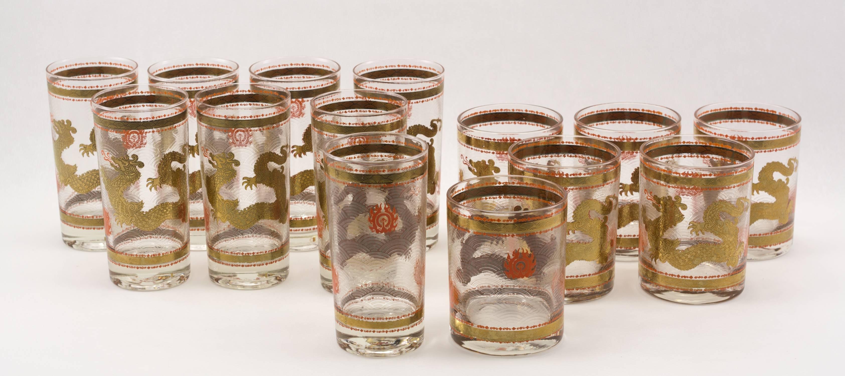 14-piece vintage barware set with dragons and flaming
Pearls in 22 karat gold and orange enamel on a frosted ground
with a textured surface.
Eight highball and six rocks glasses.

Measurements:
Highball  5-1/2” H
Rocks 4-1/8”
