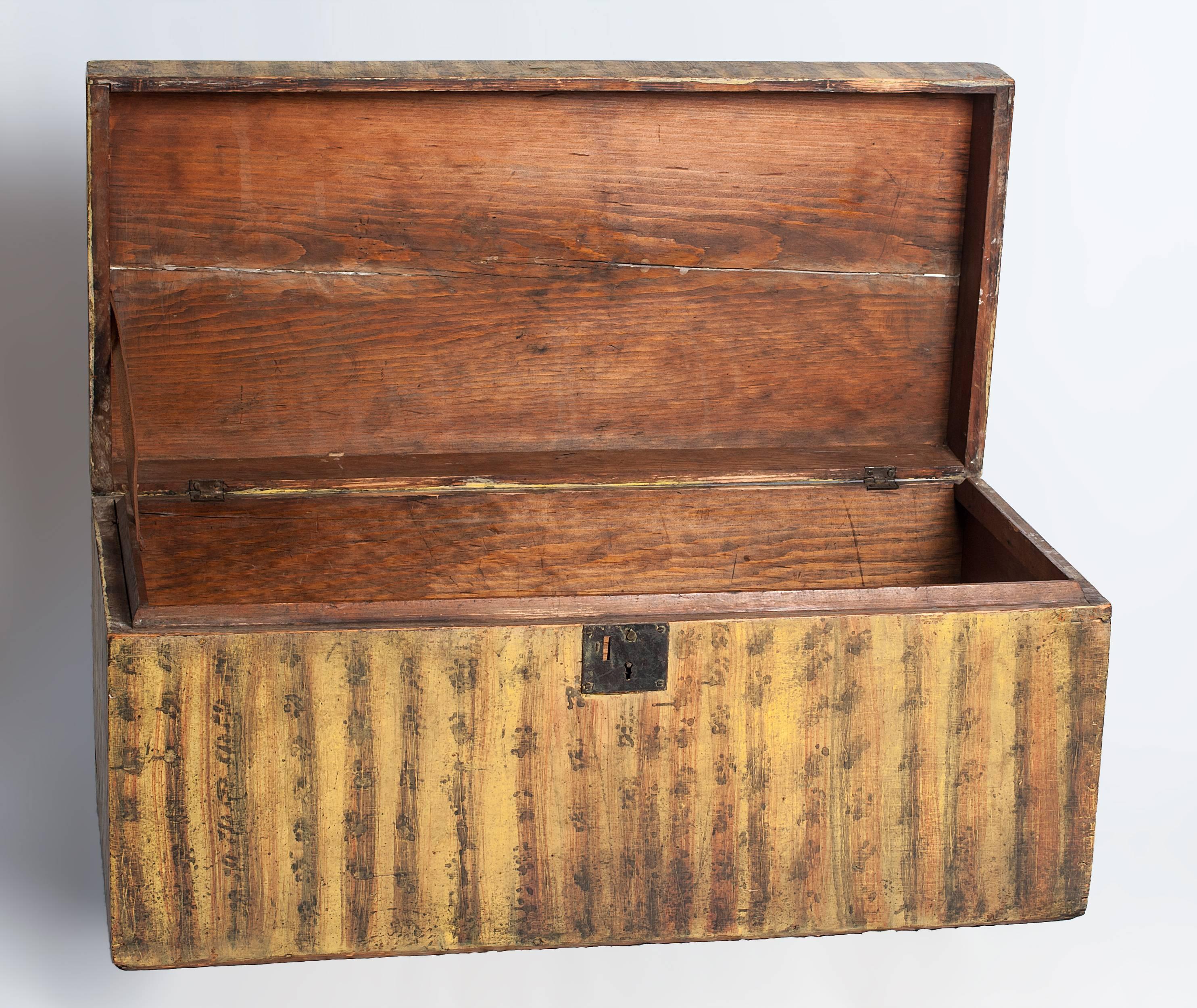 Painted decorated blanket box. Retaining its original yellow and red sponge decoration with black highlights.Made from Pine with rosehead nails

New England, c.1850 15 ¾” 35 ½” 16 ½