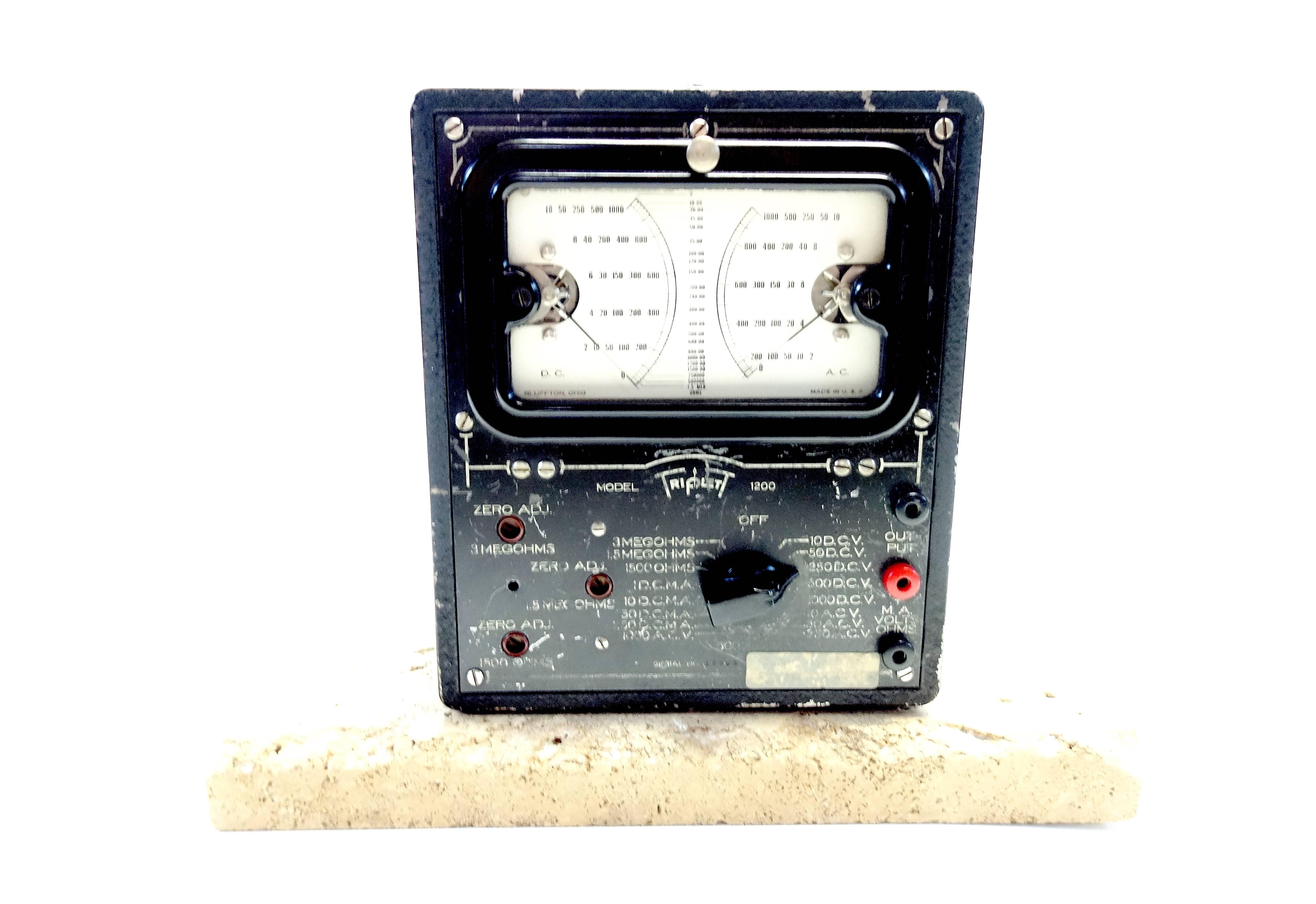 Submitted for your consideration is this, circa 1934, Triplett Universal Electrical Meter. Your choice of buying it mounted on a stone slab as shown or unmounted.
Beautiful desk or shelf sculpture or accessory. Front meter panel tilts out for other