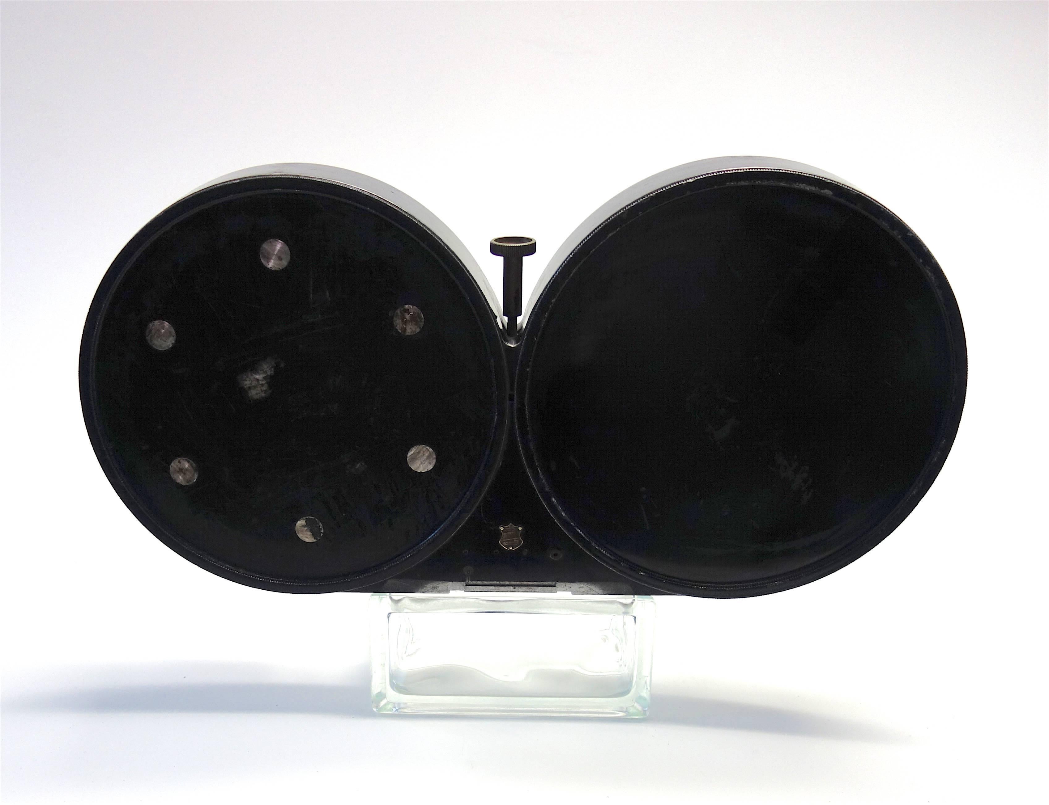 Submitted for your consideration is this early 20th century 1000 ft. 35mm film magazine that was used on the Bell and Howell Model 2709 Hand Crank Motion Picture Film Camera.
This was the same model camera used by Charlie Chaplin and most early
