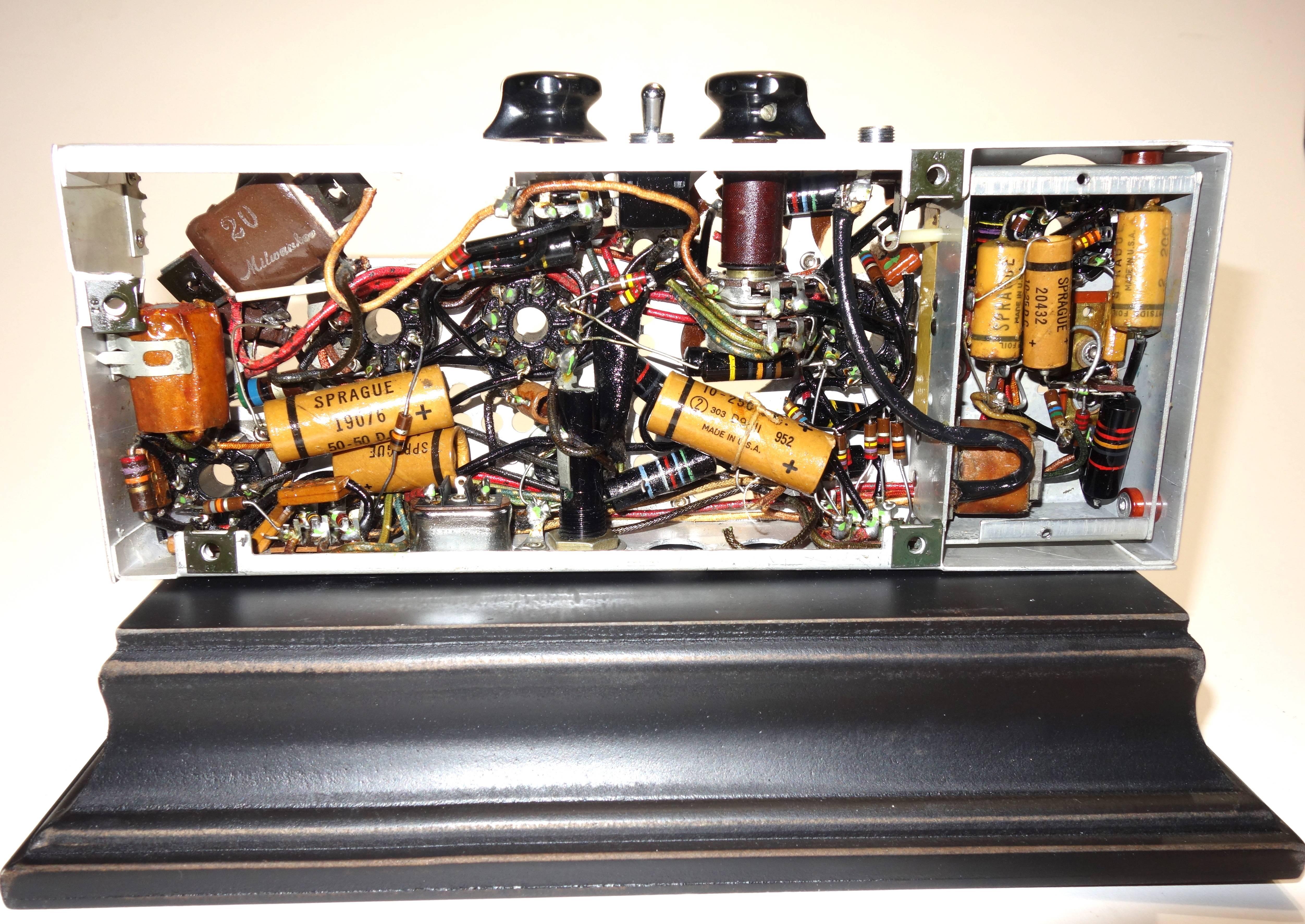 Submitted for your approval is this circa mid-20th century circuit electronic array artifact from a primitive professional movie projector. Mounted on a wood display stand, as sculpture by Bill Reiter. All American made components and offered as a