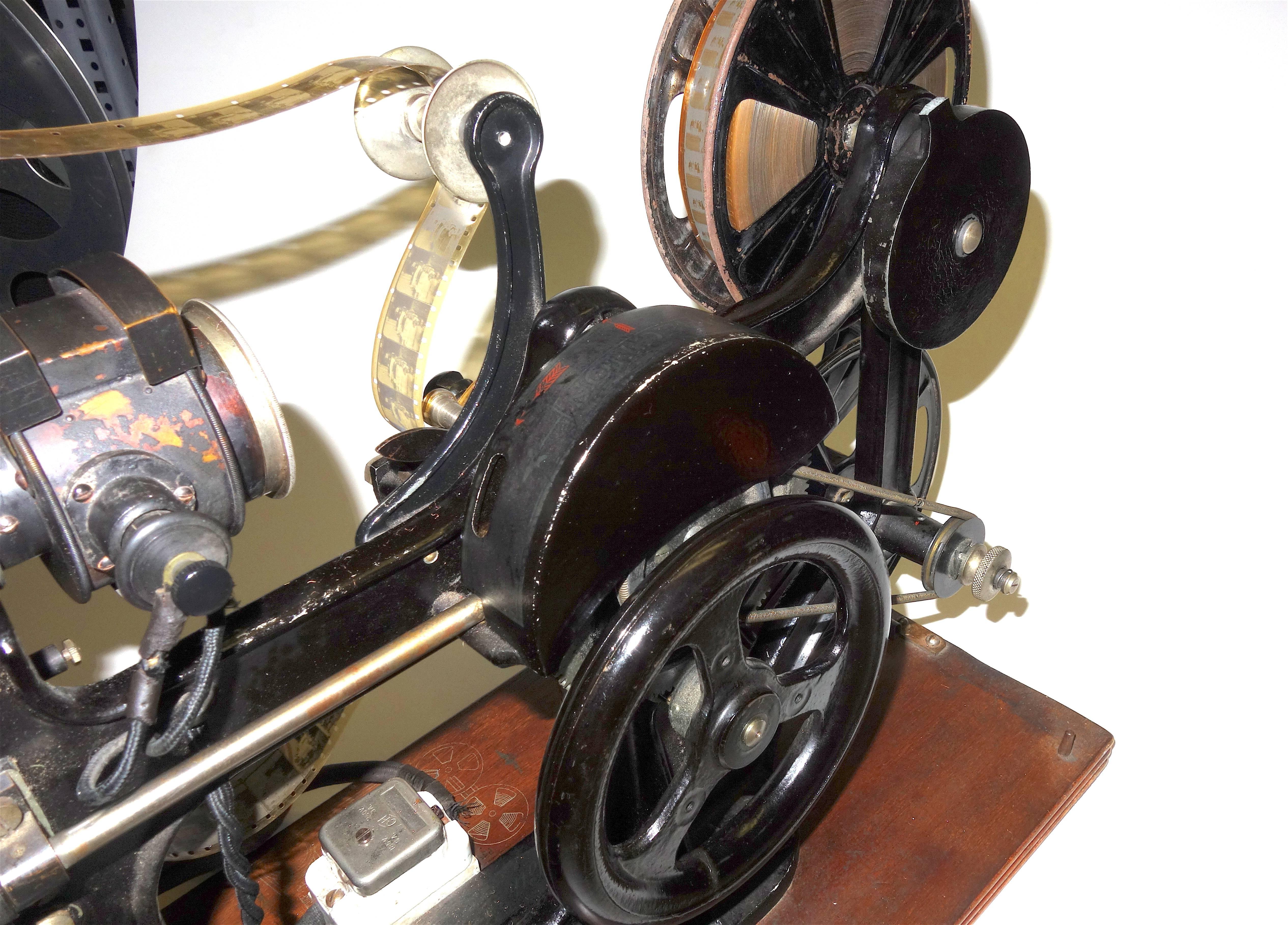20th Century Pathe 28mm Hand Crank Movie Projector, circa 1918, with Film, Vintage Sculpture For Sale
