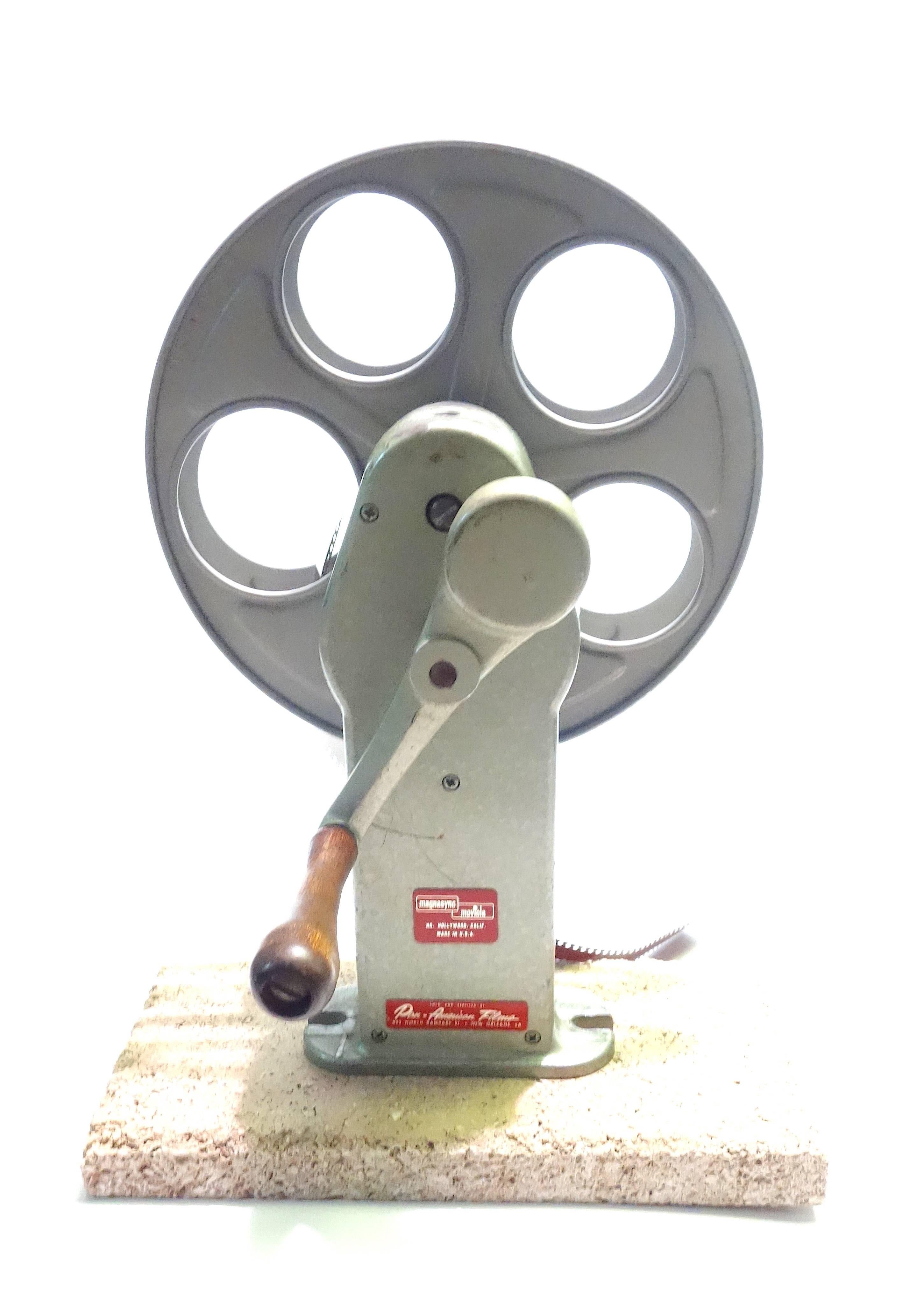 Submitted for your appreciation is this Cinema motion picture 35mm editing rewinder. Complete with 35mm take up reel. A true Hollywood mid 20th century artifact.

NOTE: Our selling prices are usually pre discounted and intended to be at 'Designer