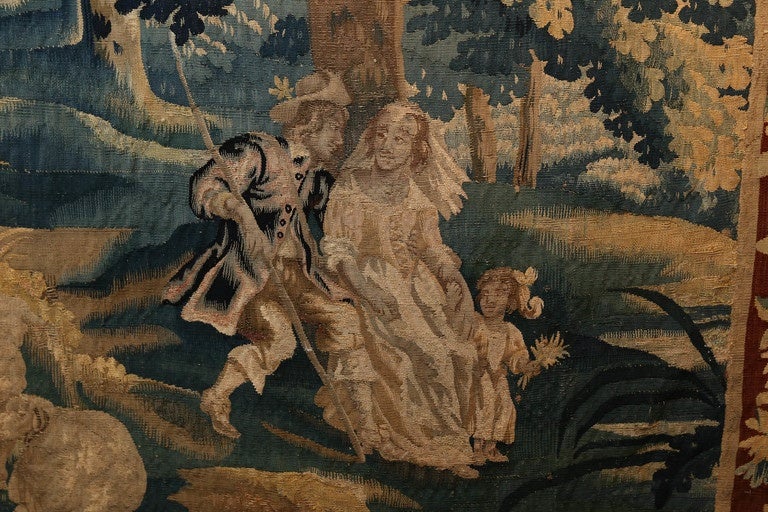 A Flemish tapestry of exceptional quality. It has retained great Color
And the condition is remarkable with only minor restoration. it is
Made of wool and it is hand woven. the design incorporates a courting
Couple under a tree with their flock