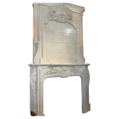 Cheminée de style français en marbre blanc sculpté à la main