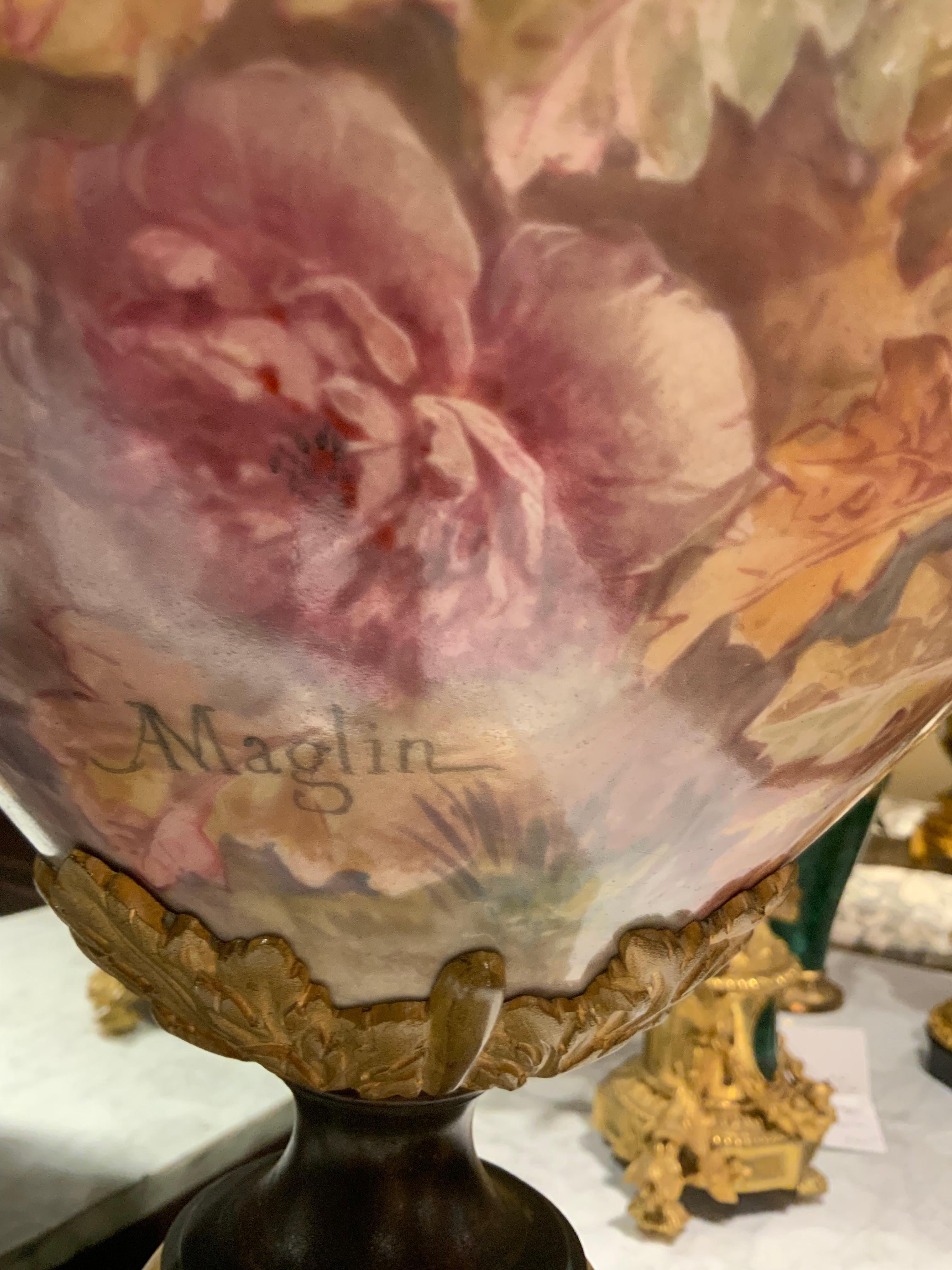 The magnificent large size makes this piece rare.
The painting is very well done and the color combination 
Is exceptional. The top and bottom is painted in a cobalt
Blue hue with gold accents. It is signed by the artist
On the lower left side