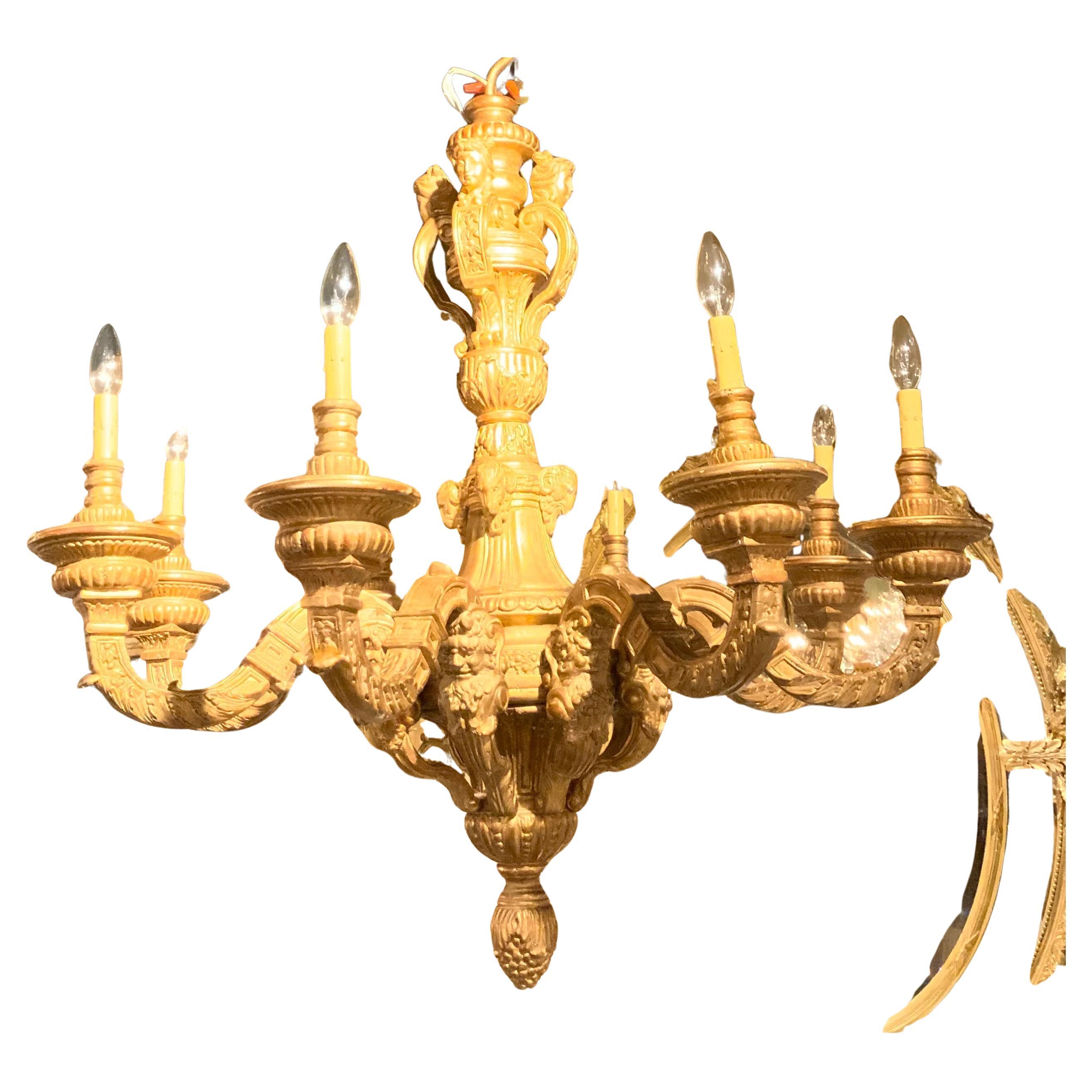 Large giltwood eight light chandelier in the Regence style