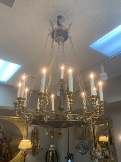 Empire style black enamel and gilt brass chandelier