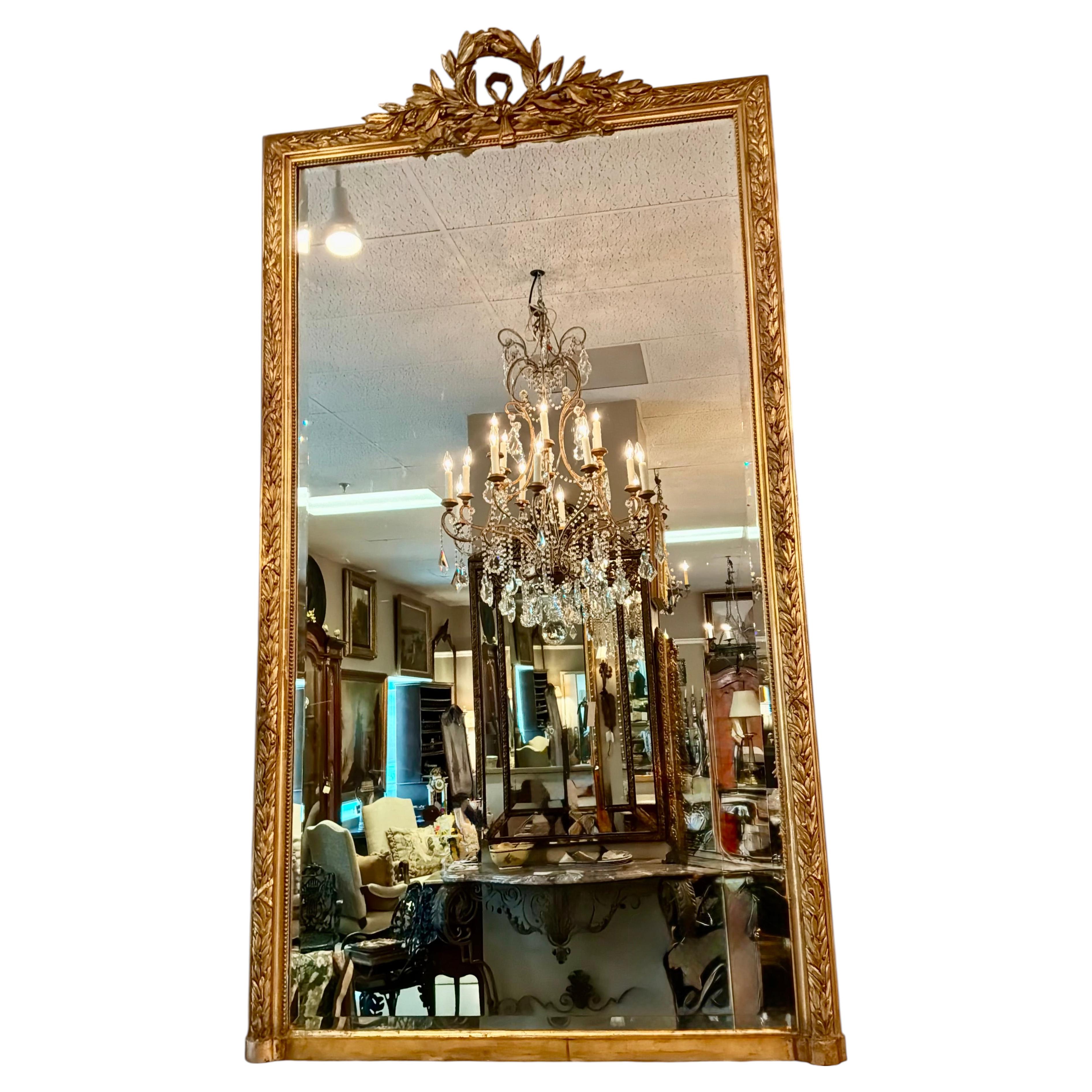 French gilt wood framed mirror, 19 th century Louis XVI style beveled mirror