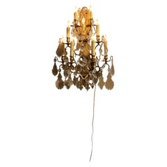 Pair of large French gilt bronze and crystal wall sconces
